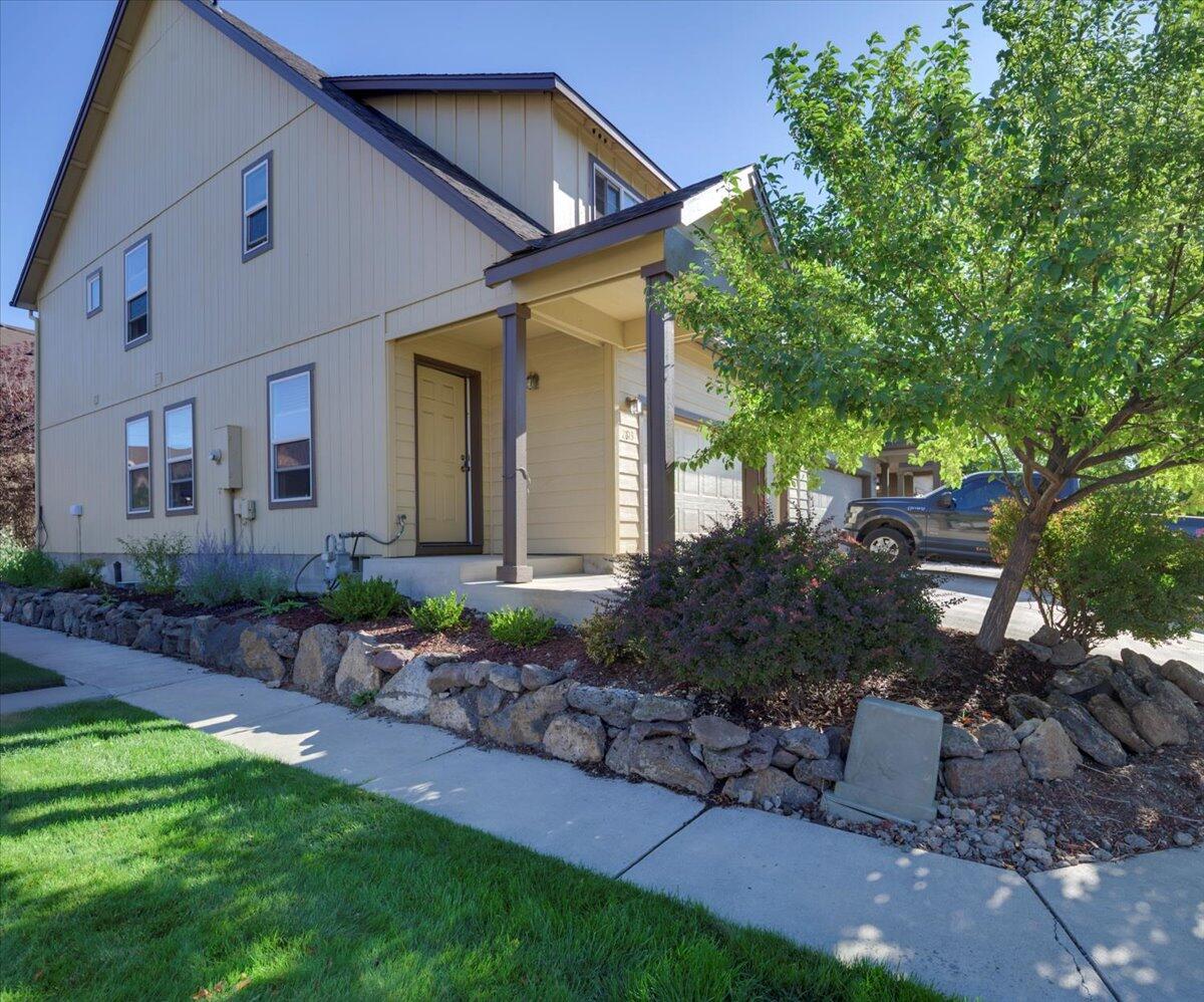 Don't miss this opportunity to own a beautiful townhome in the highly sought-after Juniper Glen North neighborhood. Situated on a desirable corner lot, this home offers extra outdoor space and additional parking. Inside, the open-concept main floor flows seamlessly from the kitchen to the dining area, into the living room, and a spacious office nook. A convenient half bath on the main level is updated with a new ADA-compliant toilet and safety bars. Upstairs, you'll find 3 generous bedrooms, 2 full bathrooms, and a laundry area for added convenience. Best of all, this property has an assumable VA loan at just 3.125%, offering an incredible financing opportunity.