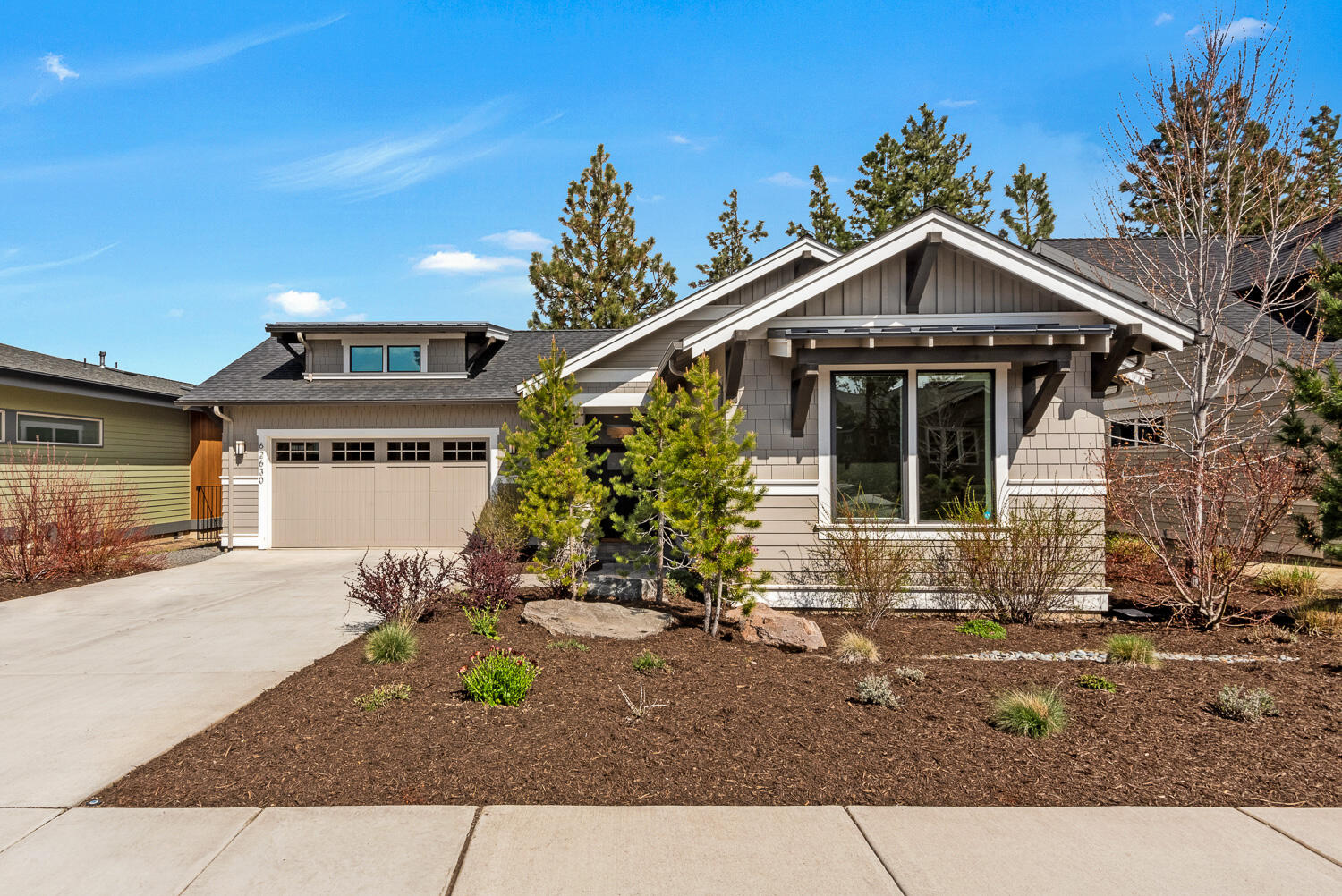 Welcome to Three Pines Ridge, where tranquil living meets outdoor adventure in NW Bend. This stunning one-story home offers the perfect blend of contemporary comfort and modern luxury. Impeccably designed with high-end finishes, the open-concept layout boasts a spacious great room with abundant natural light. Chef's kitchen featuring quartz countertops, stainless steel appliances and a spacious island perfect for hosting gatherings. Three bedrooms and two baths provide ample space for all. A generously sized office offers versatility for remote work or creative pursuits. Step outside and enjoy the warm glow of the fire pit, perfect for cozy evenings under the stars; or enjoy ultimate relaxation in the hot tub, where bubbling jets melt away the stresses of the day. The spacious garage offers ample storage for all your gear. Immerse yourself in the beauty of Bend, with direct access to Shevlin Park and an extensive network of hiking and mountain biking trails right outside your door.