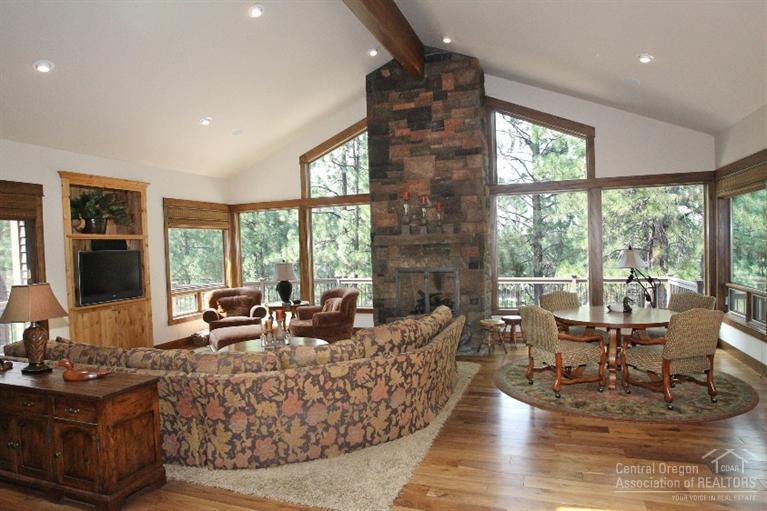 Very private, end of cul-de-sac location, sitting on a gorgeous treed setting above and overlooking the 15th fairway of Broken Top golf course. Beautiful Northwest Lodge inspired home lets you feel like you're living in a tree house. This home provides approximately 5,000 sf of living space, 4 bedrooms, 4.5 bathrooms, dedicated office/den, nice sized bonus room, plus an oversized heated triple car garage.