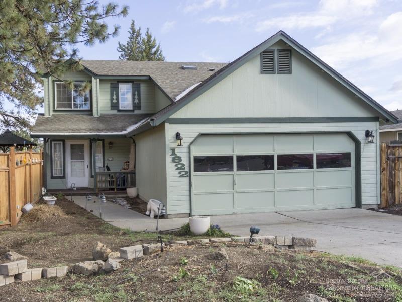 Don't miss this great buy in NE Bend! Situated on a huge and private quarter acre lot, this adorable 1735 square foot home has 3 bedrooms, 2.5 bathrooms, and bonus room. Additional features include R.V. parking, a newer roof, forced air heat, A/C, fully fenced backyard with sprinkler system, spacious kitchen, laminate and tile floors, utility room, storage shed, hot tub, deck, gazebo, water feature and an attached 2 car garage. Great location with easy access to 97, the hospital, and schools.