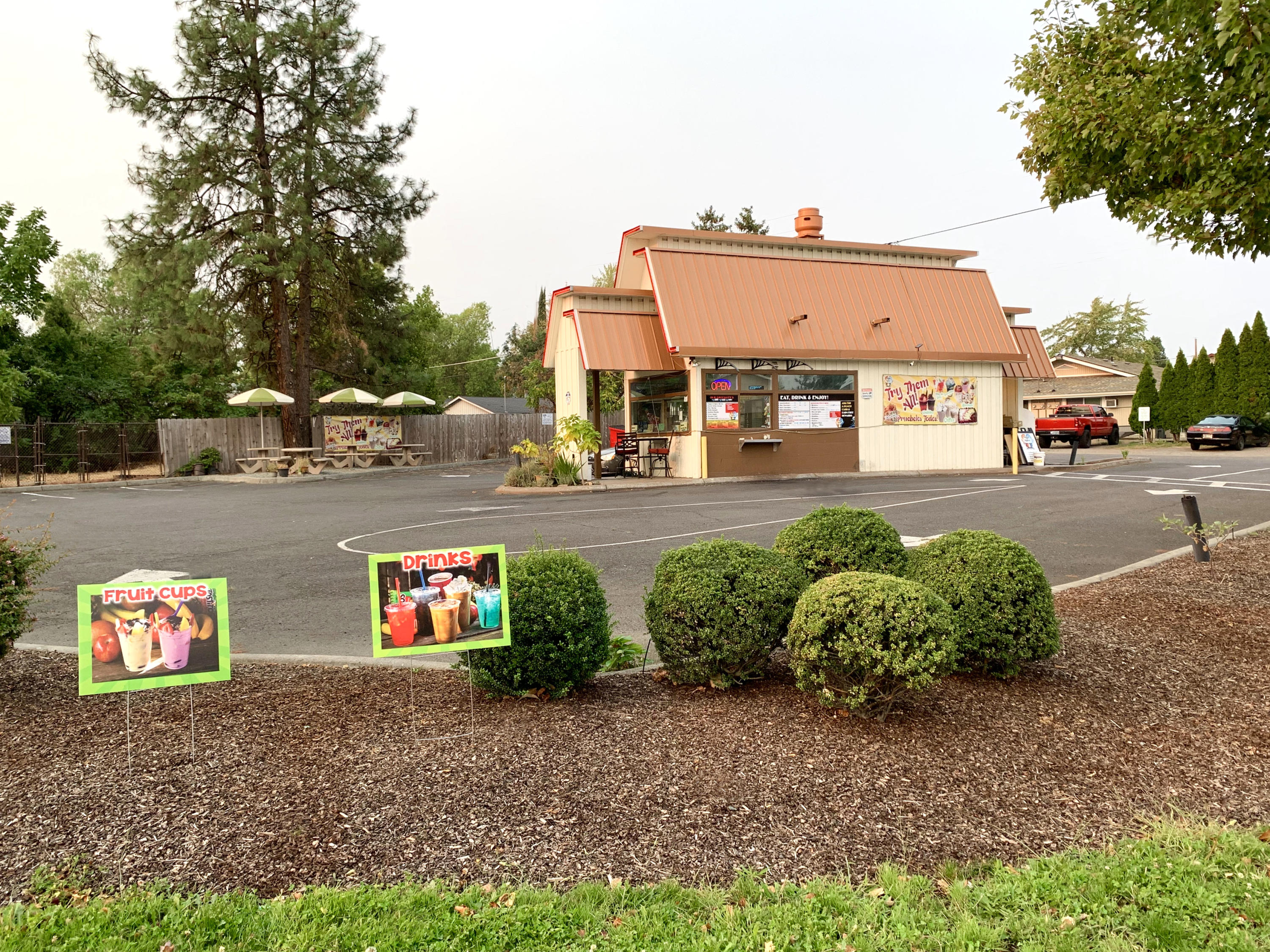 High visibility drive-through business location. Large .28 acre corner lot zoned C-S/P, Service Commercial – Professional Office that is located on the SW corner of the West Main and Columbus Ave. intersection. Currently tenant occupied with the potential for owner occupant. The 328' sq.ft. structure was built in 2004 and has been used as a drive-through coffee shop, BBQ restaurant, and is currently a drive-through coffee & fruit shop. The property is paved and landscaped with access from both Columbus and West Main. The lot is nicely landscaped with an auto-sprinkler system and outside seating area. The 2016 City of Medford Traffic Study estimated that this arterial street location has exposure to approx. 24,000 cars per day. This is a unique opportunity at a time when fast & easy access to products & services is on the rise. All information deemed accurate but not warranted. Use and conditions should be validated by interested parties.
