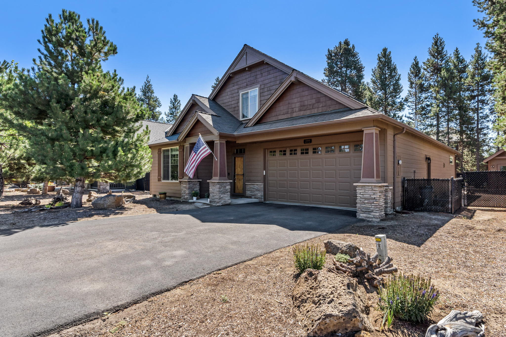 Beautiful Pahlisch built home has been well maintained and is perfect for larger family or vacation home.  Primary on main floor with on-suite bath, walk-in shower, soaking tub, water closet and dual vanity. Vaulted ceilings in both primary and Great Room, with archways that add character!  Gas fireplace with floor to ceiling stone surround, hearth & mantle.  Large working kitchen with lots of hickory cabinets and counter space, plus walk-in corner pantry.  Second floor Guest Suite and bonus room. Outdoor space includes large patio, accessible from dining or primary suite. Fully fenced back yard with Xeriscape landscaping and 10X12 Garden/Storage shed on slab with electricity. City Water/Sewer, Gas furnace plus A/C. Community Amenities include paved walking/biking trails, clubhouse with fitness room, playing/soccer field, paved sport court and sledding hill!