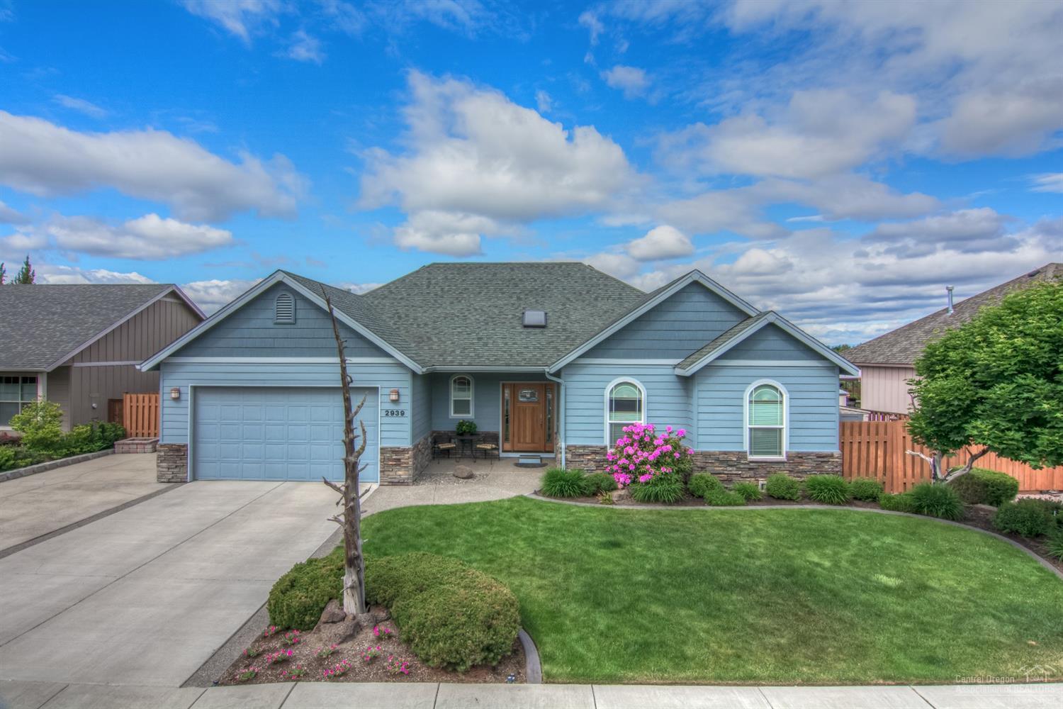 Come home and enjoy fabulous Cascade Mountain views from this immaculate and spacious home. Sitting on Redmond's Dry Canyon, you will be awed as you step in through the front door as the large windows frame the beautiful Central Oregon landscape. This nicely updated single level home is 3 bed/2 bath plus a den/office. Relax in the large fenced backyard with a paver patio and hot tub and enjoy those same stunning views!