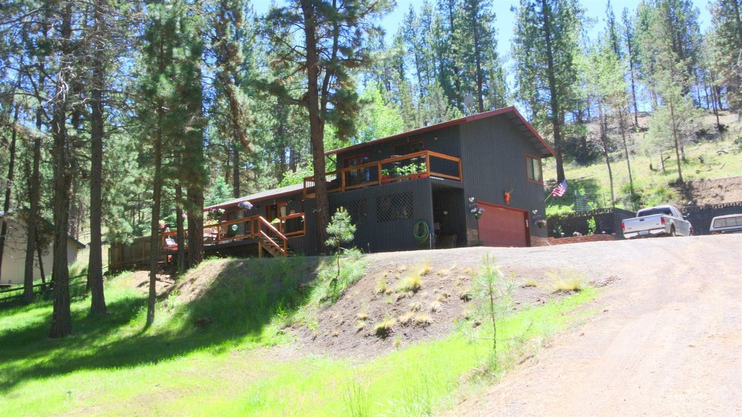 Wonderful setting across from Camp Polk Preserve on 1.25 acres lies a 1417+/- sq ft, 3-Bedroom, 2-Bath home about 4 miles from Sisters. Vaulted ceilings, open great room, wood floors, private decks. Master Bath shower recently tiled. Wired for hot tub. Lots of room to park the RV & boat, or even add a shop. NO HOA's or CCR's. Private well. Property extends to fence lines.
