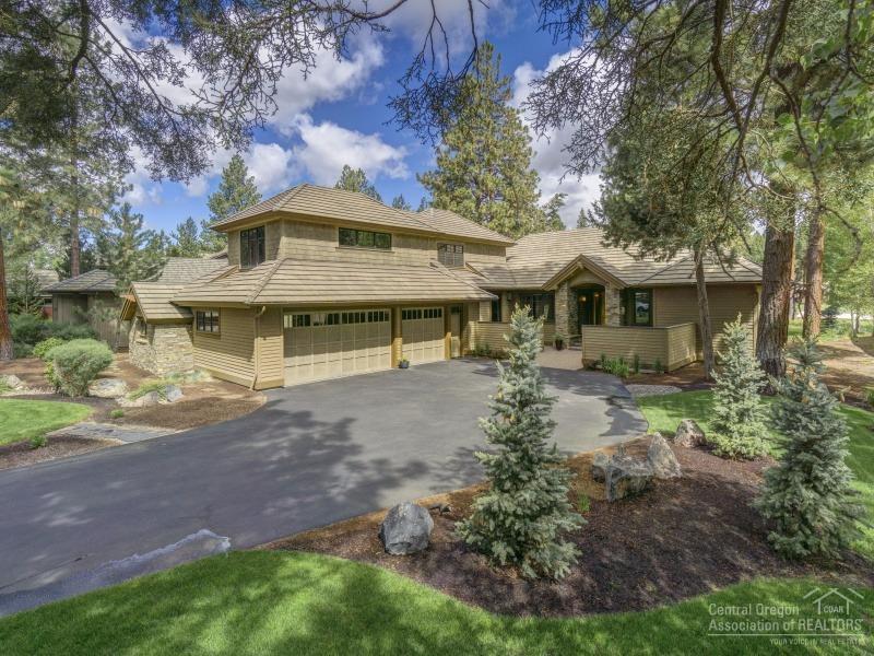 Stunning Pacwest blt home on the 3rd hole of prestigious Broken Top. Open great room floor plan w/floor-to-ceiling windows overlooking the course & stacked stone FP w/blt-ins. Spacious kitchen features lrg island w/breakfast bar, granite tile counters w/tile backsplash, abundance of cabinets, pantry & blt-in hutch. Main level office w/blt-in desk & cabinets. Master w/lrg bath, tile floors, dbl vanity & lrg tiled shower. 2nd master on the main level. Bonus room & 3rd bedroom upstairs. Fabulous landscaping!