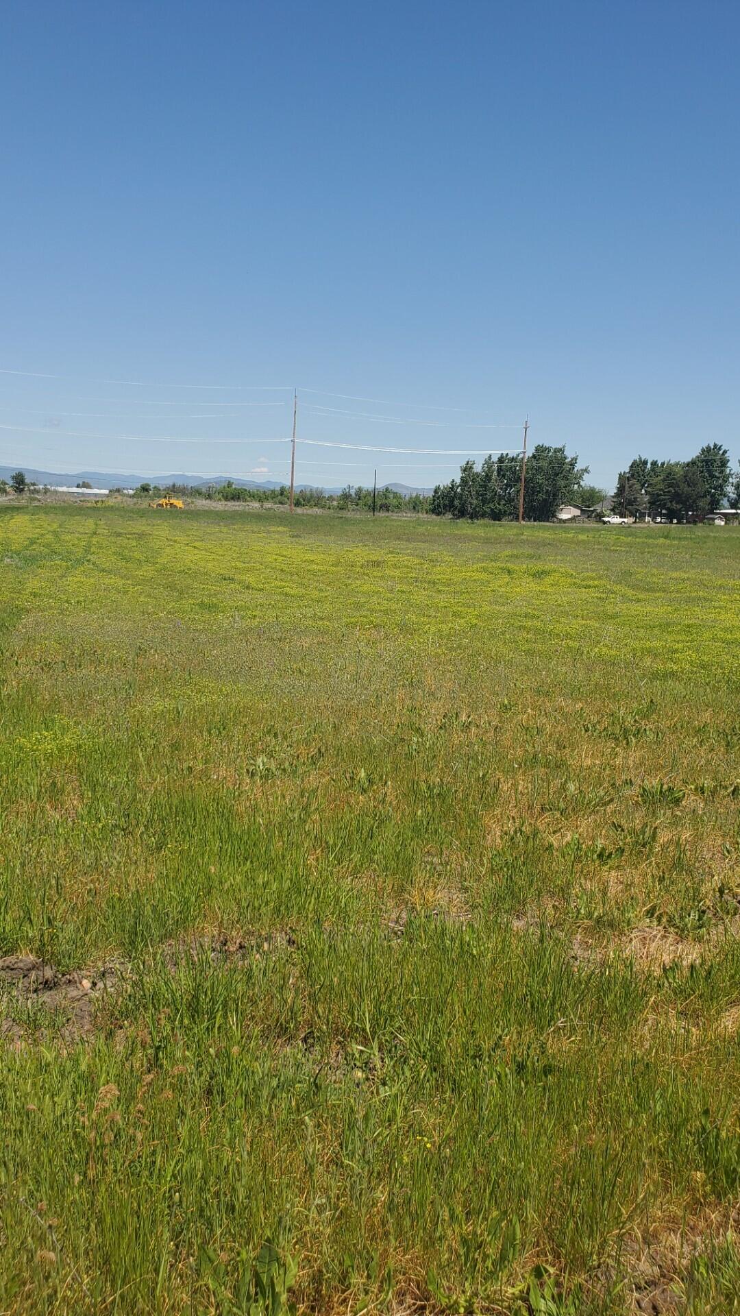 Prime commercial opportunity located on 17.09 acres along E. Vilas Road in Medford's coveted Opportunity Zone, offering substantial tax advantages. This vacant land sits strategically within a thriving 187-acre mixed-use development featuring residential homes, apartments, and complementary commercial services-creating an instant ecosystem for business success. Already annexed into the City of Medford with development scheduled for summer 2025. Position your venture within Southern Oregon's fastest-growing corridor where a built-in customer base will live, work and shop. Additional commercial parcels are available for larger concepts or phased development strategies. Secure your place in this master-planned community that combines tax incentives, prime location, and immediate development potential.