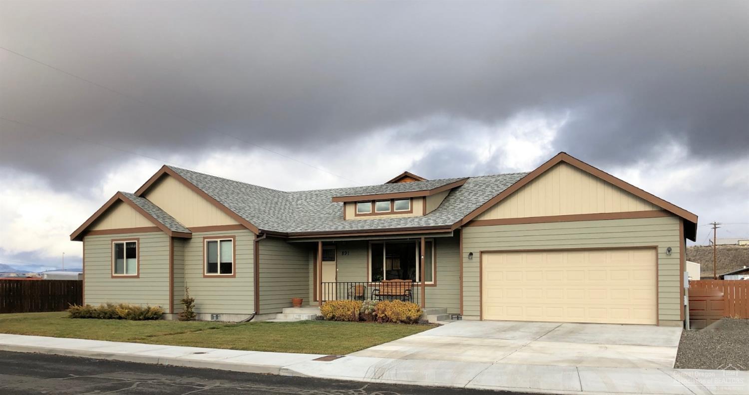 This home has been meticulously cared for. Great location, close to town and conveniences. 3 bedrooms and two baths with open living and a super nice kitchen, walk in closet, lots of storage, two car garage, storage shed, and laminate flooring throughout. Other upgrades include wider doors, accent walls, water softener, gas fireplace, custom cabinets, and gutters.