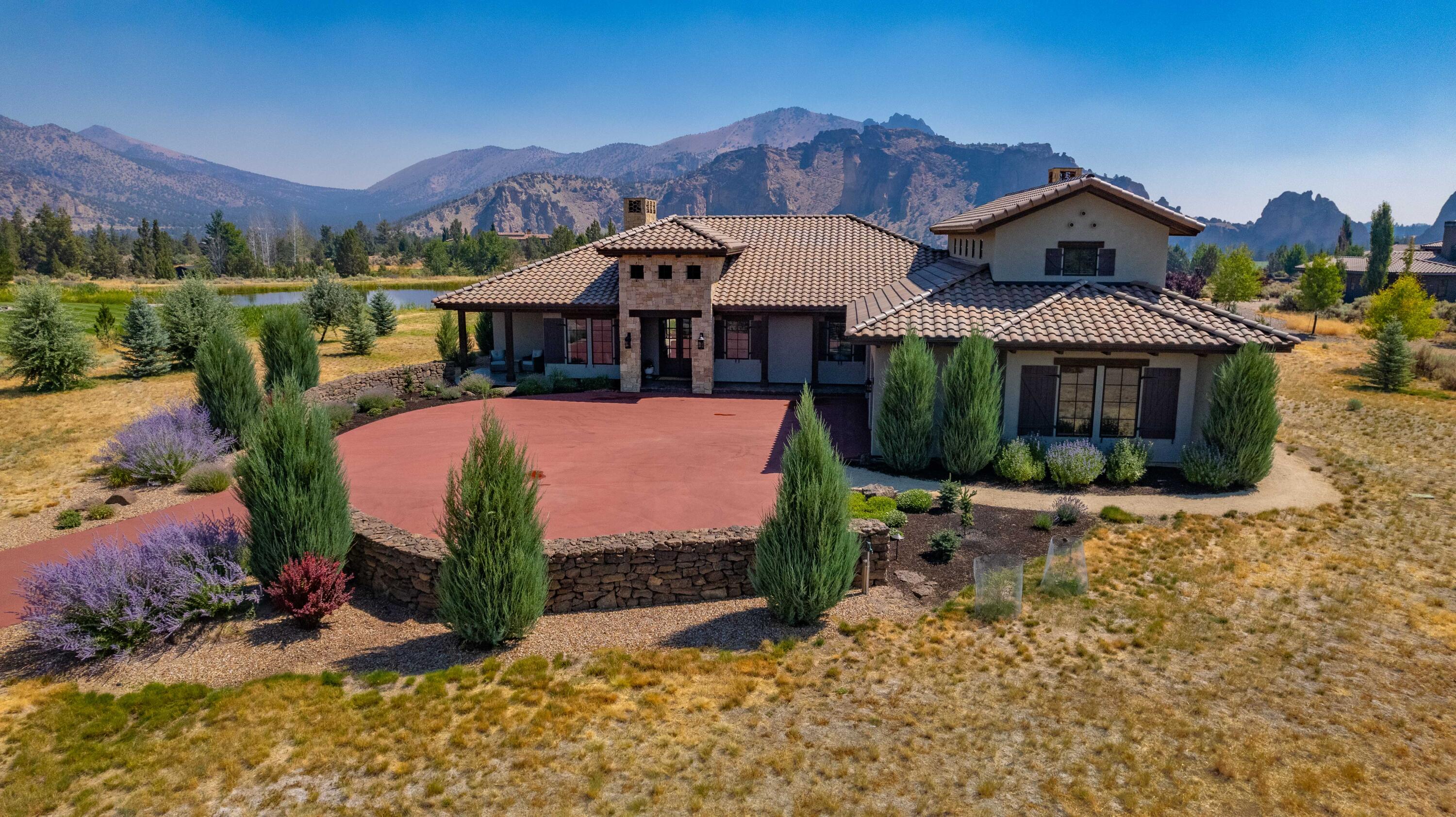 Experience all the wonder of living in The Ranch at the Canyons. As you enter through the gates the vast expanse of nature pulls your eyes to the unforgettable views of Smith Rock. Meandering community roads guide you through a peaceful life lived on a refined working ranch with HOA inclusion of horse boarding at the equestrian center, Clubhouse with pool/hot tub, workout room and entertaining space, meadow and vineyard maintenance, trails, stocked ponds and more. Built in 2018, this elegant European style home is thoughtfully designed to provide its owner with separation of space and privacy, views, and ample room for family & friends. An inviting great room setting and thoughtfully planned kitchen make for an incredible wide open entertaining space. Upstairs bonus room and full bath can be a dedicated guest suite, home gym or theater. The 1200 SF heated garage and workshop has room for all your toys, fishing gear, or extra vehicle. Also enjoy the EFU zoning which keeps taxes lower.