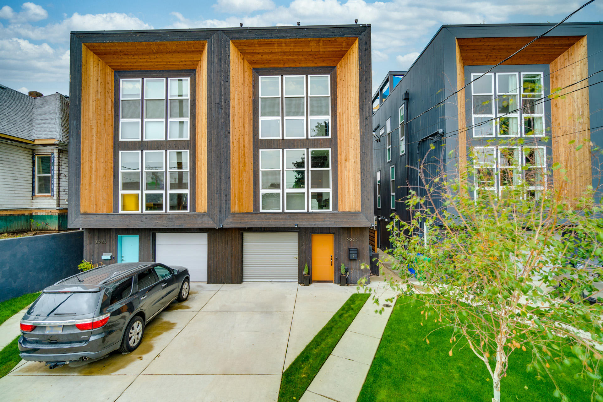 Luxury Contemporary Townhome. Tall ceilings, hardwood floors and custom finishes throughout. Living w floor to ceiling windows, and wide in-wall fireplace. Kitchen w gas cooktop, warmer, built-in cooling drawer, pantry and built in oven. Formal dining w wall of wine fridges. Main suite w private deck. Spacious guest suite. Great entertaining space on 4th floor w gas fireplace and access to 2 separate decks w gas-hook up. Studio and 2 bed ADU with private entrances. See v/tour for more info!