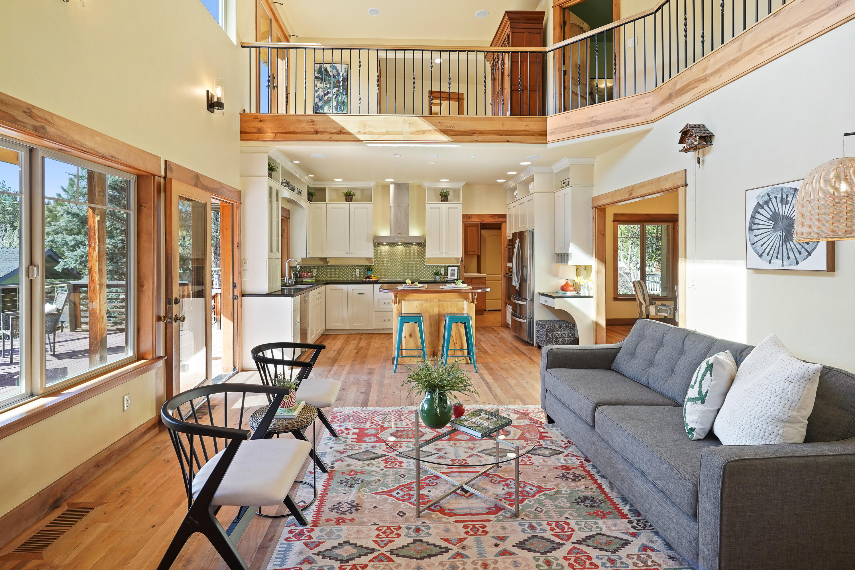 Beautifully built family home with Deschutes River Access in the heart of Tumalo! A rare find, this hand crafted home was built by the owner/carpenter, features high ceilings, skylights, Madrone hardwood floors, doors, and trim, paper-stone & Brazilian cherry countertops, Marmoleum bathroom flooring, wool carpets, hand textured walls, built in sound system, solar power for whole house, natural insulations & hardy board siding. All bedrooms have en suite bathrooms, open concept kitchen and living room, formal dining room, sunroom/art studio, loft , and bonus space w/sleeping nook. Within last three years new exterior paint, forced air heating unit, new leach field on septic, 2 new water heaters, and new appliances stalled. Fully fenced 7' front & back yards w/ cedar front porch, back trex deck, balcony & shed.