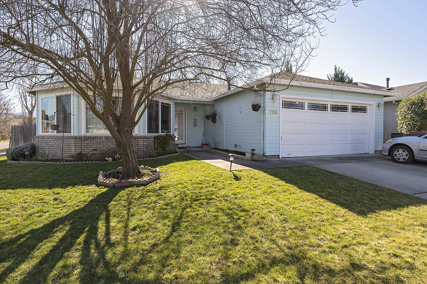 Well maintained home in South West Medford Location. The property is on a corner lot with ample space to garden and enjoy the covered paito out back. The home has a large Living room with bay window. Large kitchen with spacious counter space. Three full sized bedrooms with two baths. Upgraged hard wood flooring thruout.