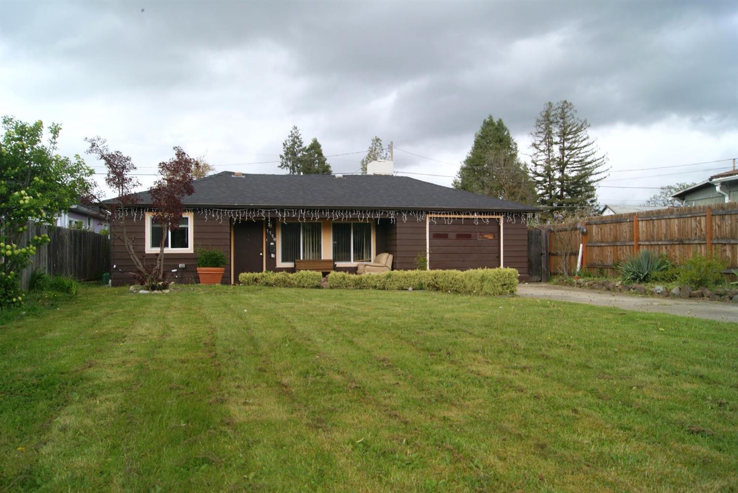 Cute Home on Large Lot. Two bedroom one bath . Newer Vinyl windows and roof. Room for RV and other parking space. Ready for new owner. Come take a look a Steal at this price.