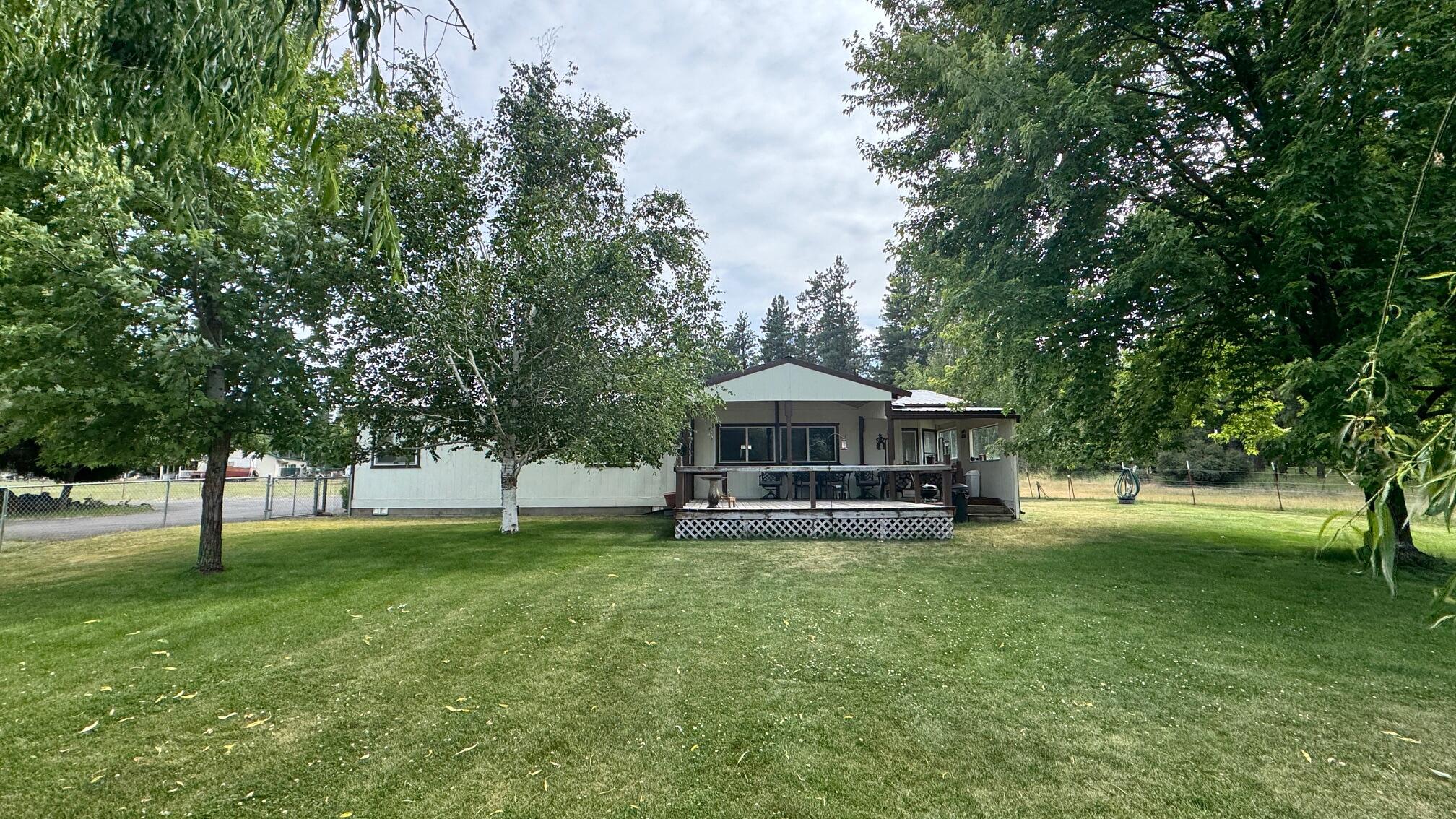 Well cared for home located in Keno with Peek-A-Boo views of the Klamath River. All new kitchen remodel in 2017 with upgraded appliances added in the last few years. Gas heat and cooking stove. Vinyl windows and ceiling fans through-out. Metal Roof on both home and garage. Exterior paint done in 2023. Updated flooring through-out. Large Primary and Secondary bedrooms. Open Living space with separate breakfast area and formal dining area. Certified wood stoves in both the house and detached finished garage. 1.96 acres fully fenced with some cross fencing, pasture, private well and access to river. Covered front deck with ceiling lighting. This house won't last!!