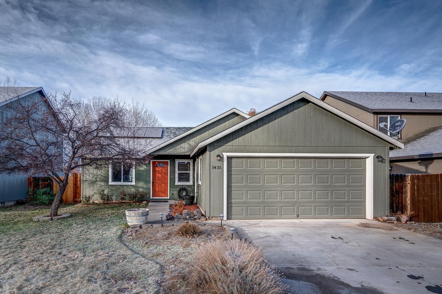 This adorable SW Redmond home is move in ready! Located across the street from an elementary school, this home shows pride of ownership. Many upgrades have been done in the past two years, including new central heating and cooling system and heat pump, solar power system, new fencing, rebuilt back deck, new exterior paint, new oven and microwave, new sliding glass door and front windows. This cozy home also features vaulted ceilings, plenty of natural light, a clean and efficient kitchen, a spacious primary bedroom, as well as laminate wood floors throughout. You won't want to miss this one!