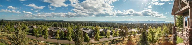 Expansive mountain views. Southern and western breathtaking views from almost every room. Main level living w/ gourmet granite kitchen, dedicated office, artist loft, 2 master suites, terrific bonus,room for a large cellar. Triple garage with epoxy coating. High level craftsmanship throughout. Beautiful cabinetry, Travertine, stone detailing. Tray ceilings, accent lighting for tasks & artwork. Trex decking. Every upgrade imaginable. Beautifully landscaped. Thoughtfully designed for privacy. Flat driveway.
