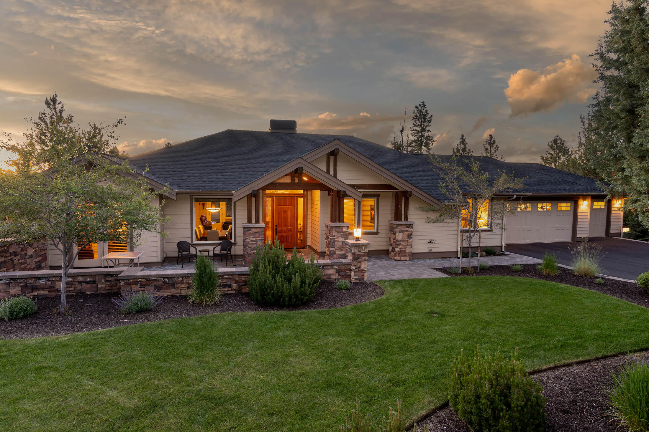 Awbrey Butte single story beauty on corner lot with flat driveway leading to your 3 car garage.  You'll love this great room floorplan with volume ceilings, gas fireplace w/ mantel, hardwood floors & wonderful views from the many windows which allow great natural light creating a peaceful setting.  Open Kitchen has GE stainless appliances, quartz counters, center island, soft close drawers/cabinets, breakfast bar, walk-in pantry, tiled floors and large breakfast nook.  Primary bedroom is spacious enough for a sitting area with walk-in closets, dual vanities, soaking tub and freestanding shower.   Laundry/mud room has sink & plenty of cabinet and counter space.  Enjoy outdoor entertaining on your massive back deck or on your front deck with views of the grassy yard.  You'll love your oversized 3 car garage with plenty of room for all your toys that you'll need when you discover the outdoor activities of Central Oregon.
