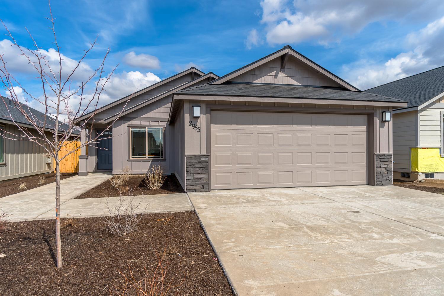 Brand new home in NW Redmond! 3 bedrooms, 2 baths, 1,464 sf w/tons of windows. Lg great room plan, open to dining w/eating bar, Quartz counters in kitchen, SS Energy Star appliances, pantry. Spacious br's, lg Mstr closet, dbl sinks in baths. Laminate flooring in main living areas. Forced air w/high eff. furnace, AC ready. Dbl garage w/covered front entry & back patio. Front landscaping w/sprinklers, fenced yard. This is currently our model home. Open 12-5pm Thurs-Mon. Martin Floorplan.