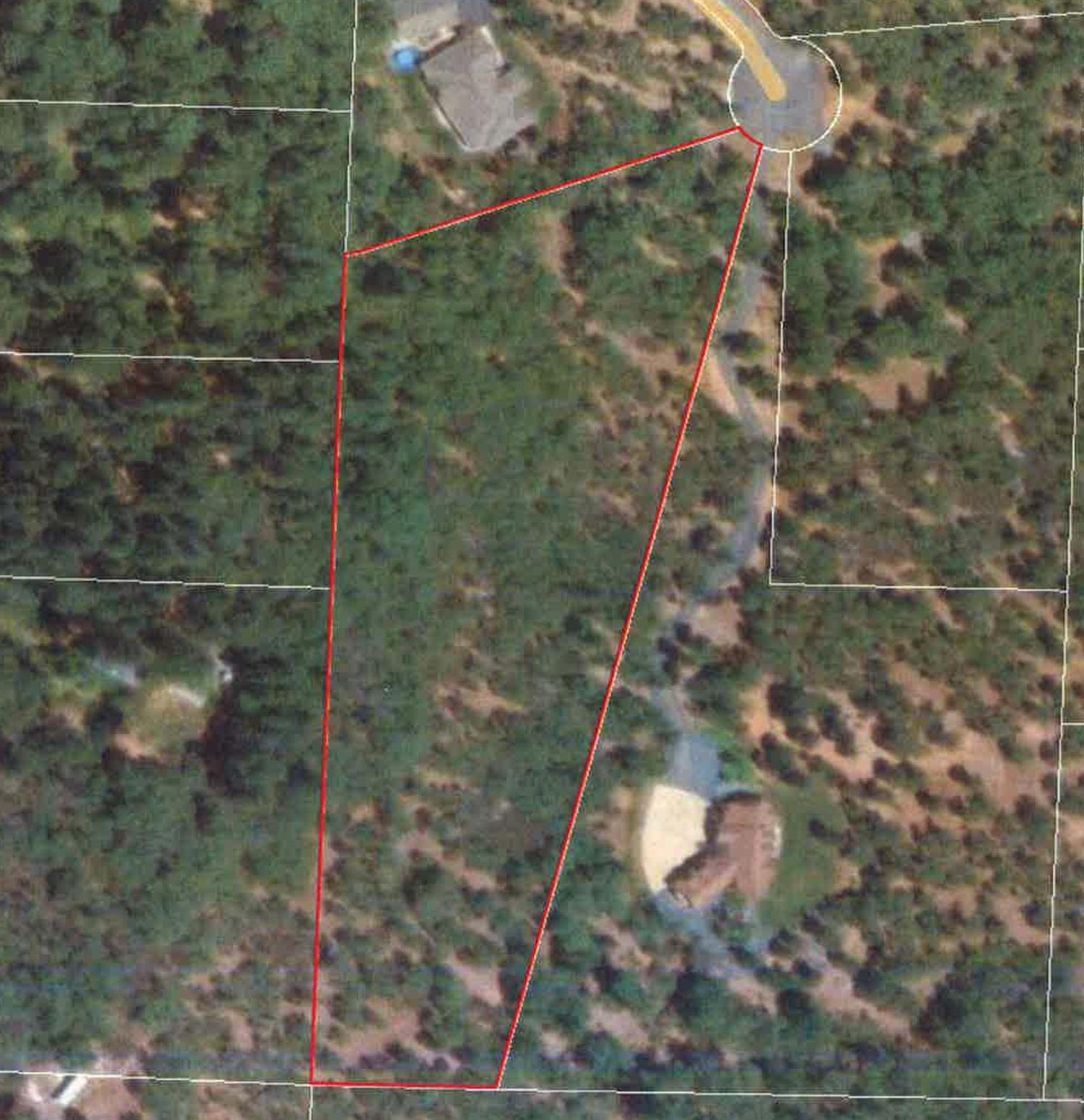 Beautiful 4.4 acre lot in an upscale subdivision in North Valley area. Nicely treed with great mountain views. Has driveway approach, homesite and septic approval, plus great well(per well log). Come build your home today! All information is deemed reliable but not verified; anyone considering purchasing this property should perform their own investigation into the uses and condition of the property.