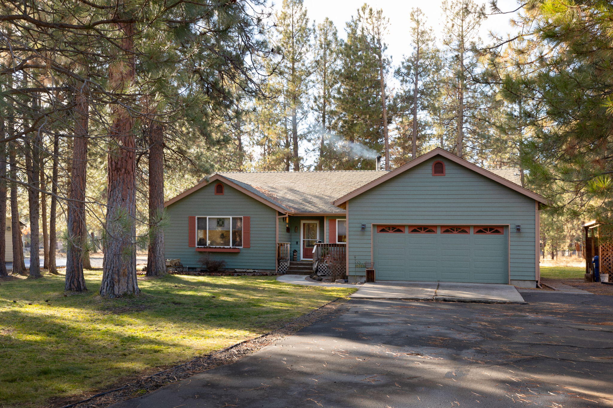 Home on .52 wooded acres w/  views of Central Oregon's stunning landscape. 3 bed, 2 bath home just minutes from Sisters w/ charming shops & dining, close to Black Butte Ranch & in Tollgate Community. 1 hour to Mt. Bachelor & 17 miles to Hoodoo for  skiing. Lots of parking plus RV parking, room for toys & guests. Detached garage is set up as 400 sq ft insulated, heated studio for guests or office. Living room w/ vaulted ceiling. Kitchen/dining/family great room w/ lots of cabinetry & prep space, pantry, cook island & eat bar. Family room w/ wood burning stove & door to deck for dining. Primary suite w/ walk-in closet & private bath. 2 more bedrooms, guest bath & laundry area complete floorplan.  HOA  includes maintenance of common areas, pool, tennis/pickleball/basketball courts, playground & trails. From nearby Suttle Lake to endless recreation of the Cascade Mountains for hiking, fishing, paddleboarding and snow sports, this is Central Oregon living at its finest.