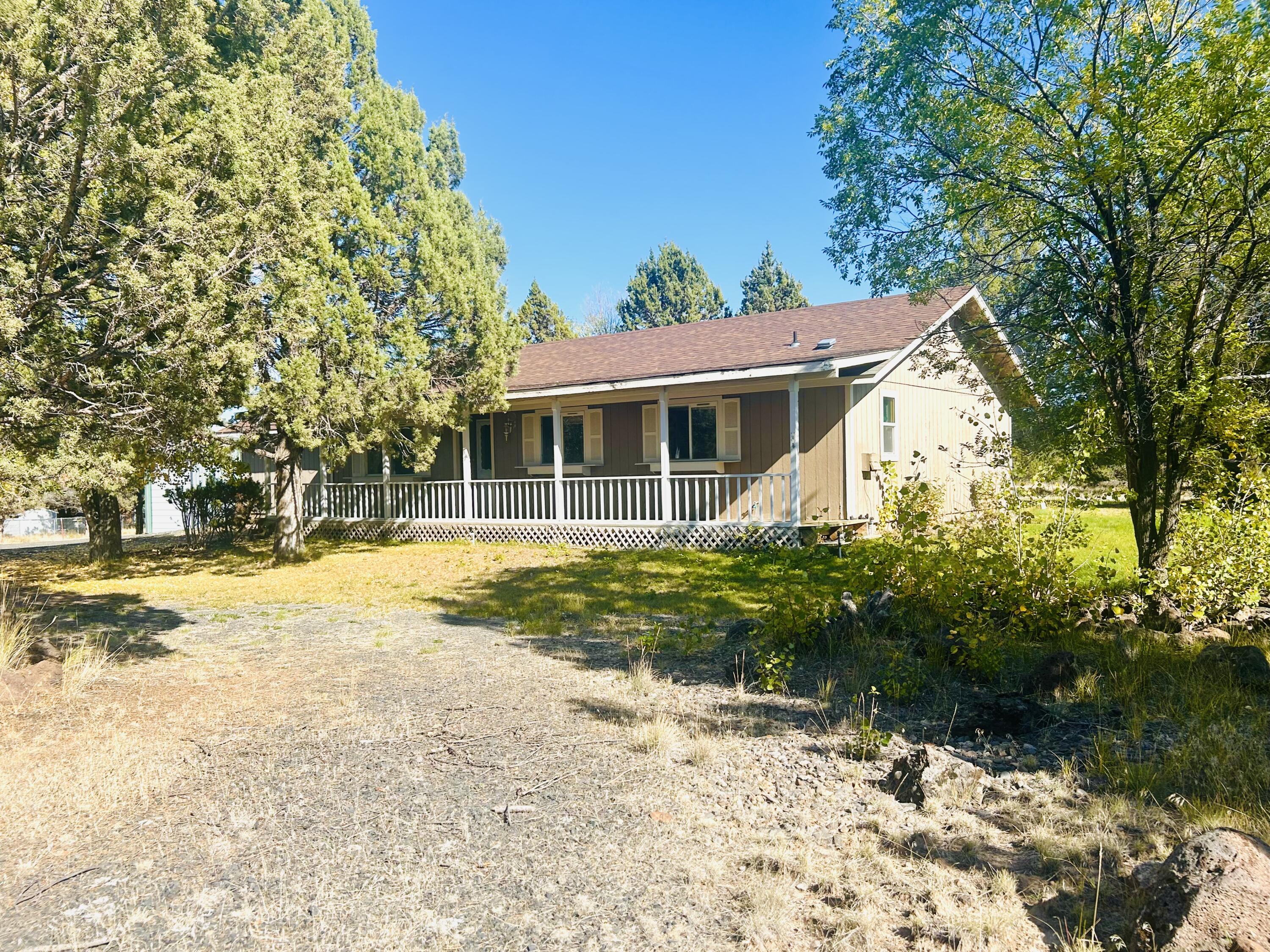 Enjoy the rural lifestyle in this fantastic location just minutes from Prineville Reservoir. The property consists of 2 acres which provides privacy and room for your toys and tools. The 3 bedroom, 2 bath home has good bones and with a little work will make a great forever home. There is an open floor plan with kitchen island and utility room with exterior door. Spacious primary bedroom with 2 closets and large bathroom. There is a good sized shop with room for your RV.