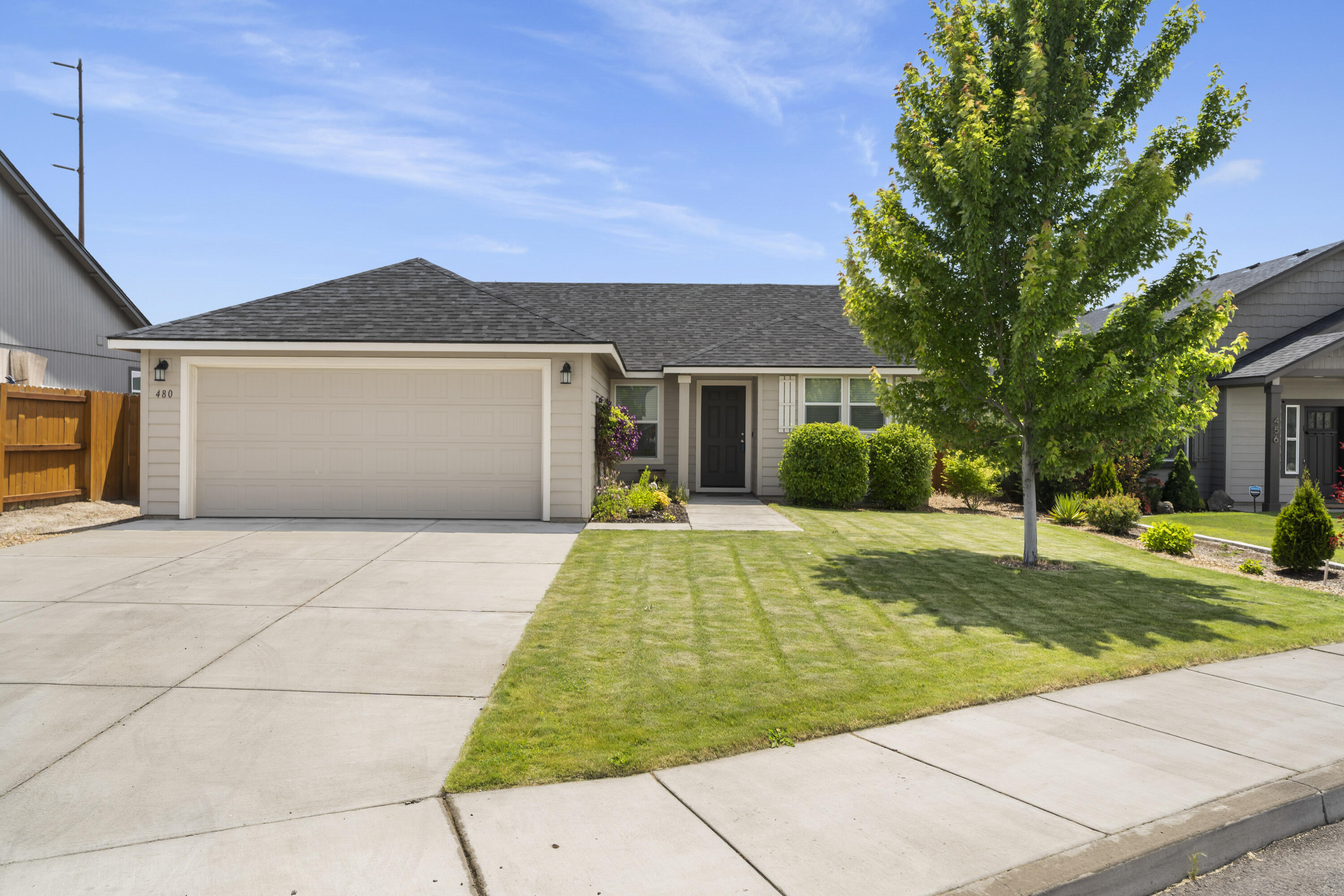 This beautifully designed 3 bedroom, 2 bath home offers a light airy feel with vaulted ceilings and a spacious living room that creates an inviting atmosphere. The interior has been refreshed with new paint in 2025 giving it a bright feeling throughout. 
The thoughtfully designed open concept seamlessly connects the kitchen, dining area, and great room—perfect for everyday living and entertaining. The kitchen offers generous storage solutions, and ample counter space.
The primary bedroom suite includes two convenient closets and a bathroom with dual sink vanities. The second bedroom impresses with an oversized walk-in closet, while the third bedroom, featuring elegant double glass doors, provides flexibility as either a bedroom or home office.
Outside you will be enchanted by the expansive, beautifully landscaped backyard—a peaceful retreat for relaxation while enjoying the Central Oregon Sky.