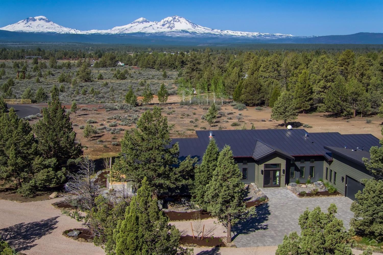 This modern custom masterpiece on 4.72 acres is everything you've been looking for! Cascade Mountain Views are displayed throughout all the rooms of the house! 3 bedrooms 3 full bathrooms and a large great room highlight this functional floor plan that lives much larger than the square footage. Gorgeous Designer Kitchen w/Open Concept Floor Plan. Stunning Master Suite w/Japanese soaking tub, office/nursery and access to the back deck. The home takes advantage of its private setting while offering an abundance of Natural Light and Stunning outdoor space. Attached Oversized 2 Car Garage.