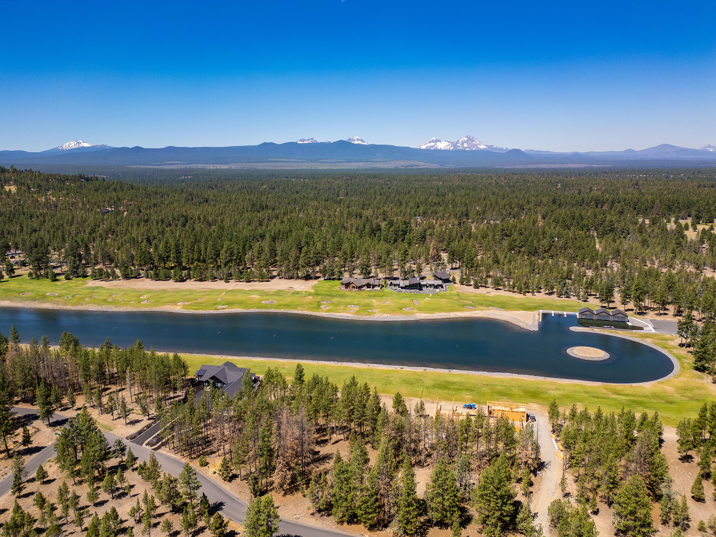 Tanager is a haven for outdoor enthusiasts seeking a harmonious blend of waterfront living and endless recreational opportunities. Located just past the edge of town on Bend's Westside, this 182-acre community provides the convenience, lifestyle, and tranquility one desires. Lot 12 stands out as one of the few options in Tanager for creekside living, boasting the unique advantage of bordering HOA property to the North and West. This particular lot offers a serene and picturesque setting, perched above the scenic Tumalo Creek canyon. Start your mornings with the soothing sounds of birdsong and the gentle rush of the nearby rapids. With a private trail leading directly to the creek, indulging in a fly fishing adventure is effortless. Additionally, the south end of a private waterski lake is steps away, providing even more recreational opportunities right at your fingertips. Tanager is more than a neighborhood, it's a way of life, and we invite you to come experience it for yourself.