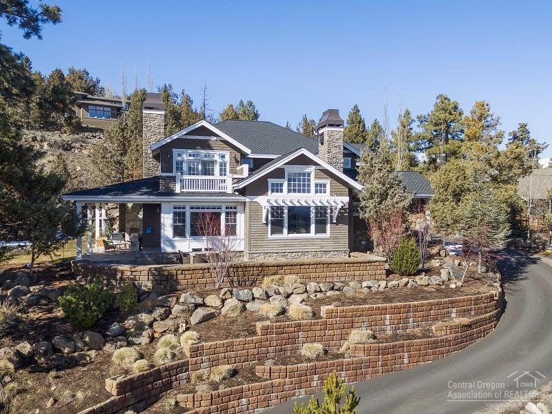 Pay attention to the detail in this fabulous, light-filled home. Extensive white woodwork includes abundant wainscoting, vaulted master tongue & groove ceiling, gorgeous cabinetry & built-ins. The kitchen boasts a Wolf range/oven, Subzero fridge & white marble island. Guest suite & office on main; huge master retreat w/ private deck upstairs plus 2 bedrooms & bonus. Addl. bonus room next to kitchen, fabulous wine cellar & tasting room, 3+ car garage, & more. Enjoy the sunrise & fireworks over Pilot Butte!