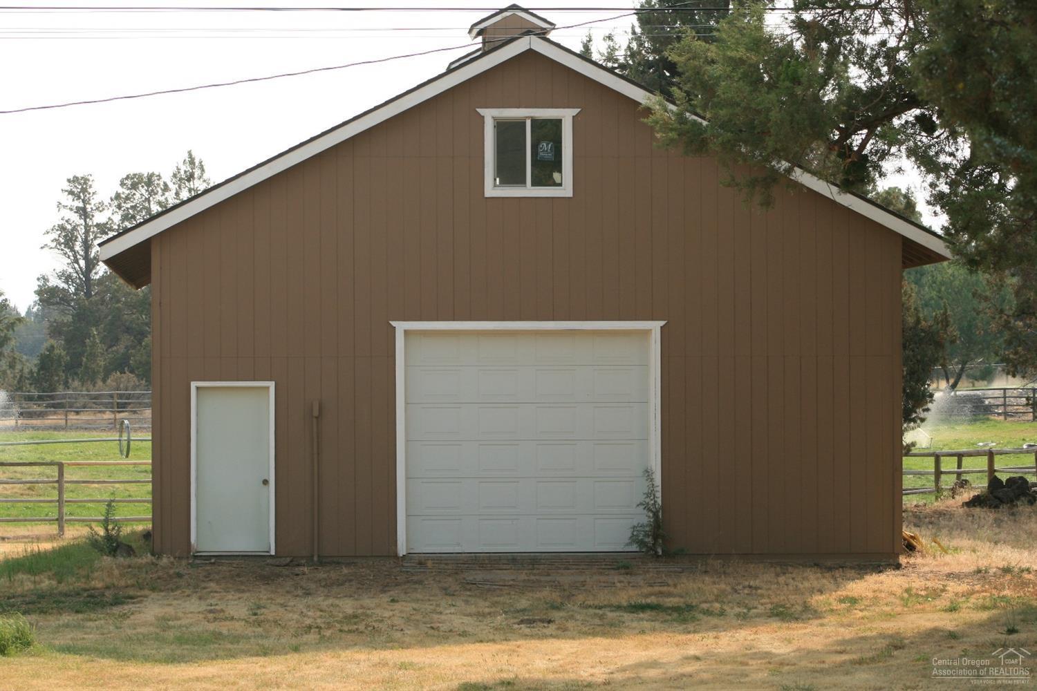 Irrigated small acreage close to town. NW location. 5.64 acres, 4 acres of Swalley Irrigation: green pastures, horse property. Newer barn with concrete floor and second level, power, 10' garage door. Bend School District. Additional building: shop, studio, storage space. Avion water, driveway, septic system installed, fenced pasture in place. Underground main irrigation line and plenty of pipe. 1973 Mobile home. Value is in the land, irrigation, other improvements, and location, not the mobile.