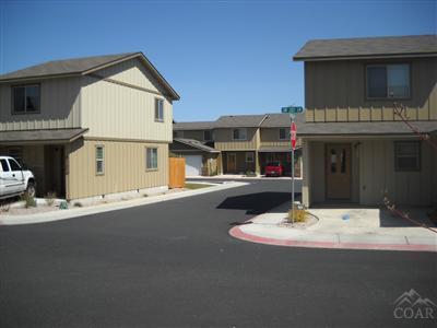 This prime 29 unit multi-family development offers a perfect blend of high quality newer construction, great location w/easy access to shopping, schools, downtown, restaurants & Hwy 97. Current rents $950 to $1,125. All units have tentative approval for Townhome conversion. Individual units feature single car garage, slate fireplace, utility rooms (some include washer & dryer), partial walk-in closets in master, and a 6x6 exterior storage area for each unit.