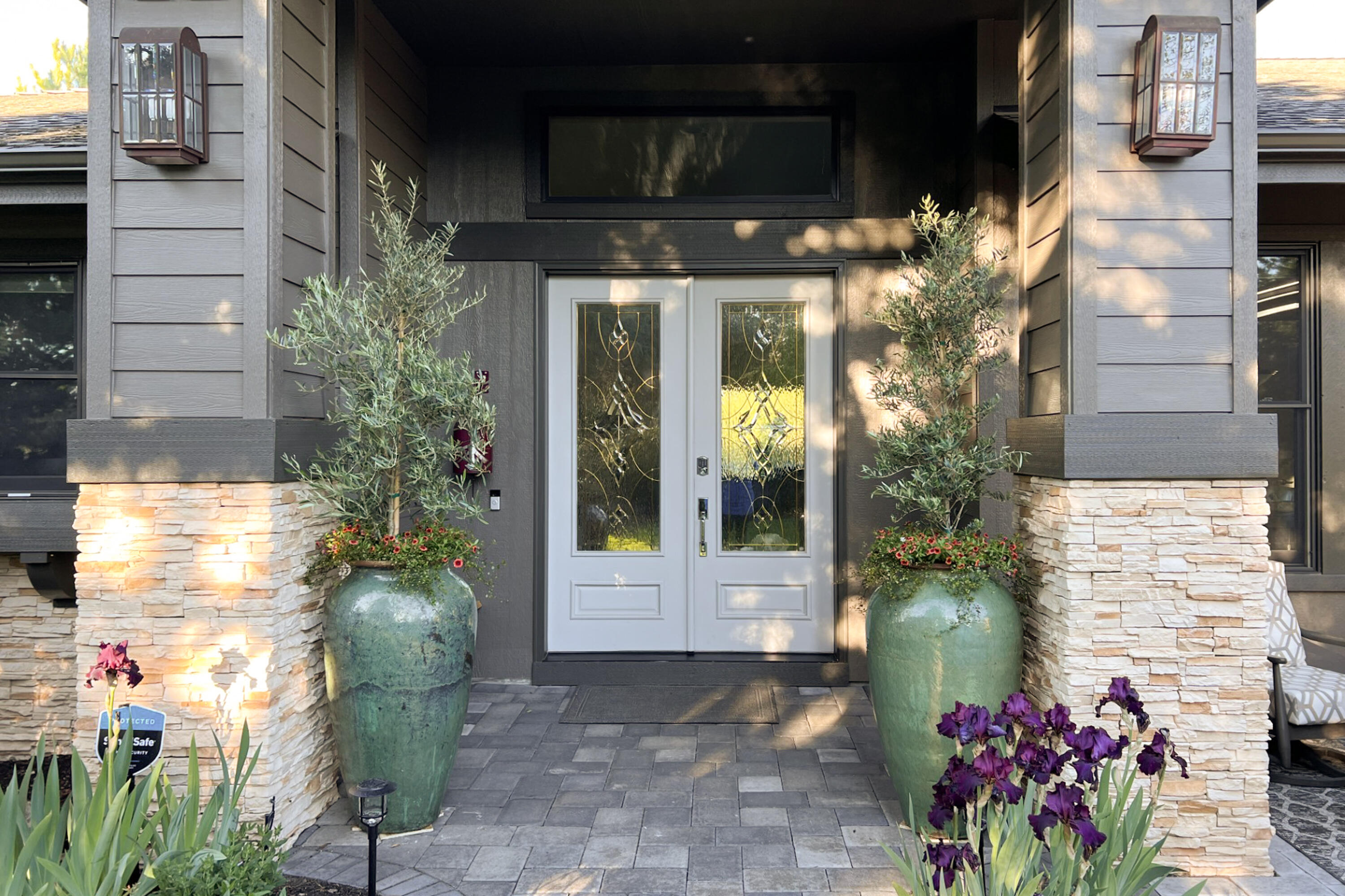 $15K incentive for closing costs, prepaids, and point buy-down kicks off this exceptional Eagle Crest Resort home. This elegant single-level retreat in a gated community boasts soaring ceilings, Italian travertine floors, and a chef's kitchen with Viking and GE Monogram appliances. A private half-acre setting includes a new hot tub, deck furniture, perennial gardens, and ample storage. The spa-like master suite features a soaking tub, walk-in closet, and shower. A stylish studio with California Closets, patio access, and brand-new carpet adds warmth. The 3-car garage offers a Finlandia dry sauna, gym equipment, new epoxy floors, a workbench, and an EV charger. Just five minutes from the river, enjoy resort-style amenities—pool, pickleball, bocce, and tennis—plus discounted access to three stunning 18-hole golf courses. This home seamlessly blends luxury, comfort, and Central Oregon's natural beauty.