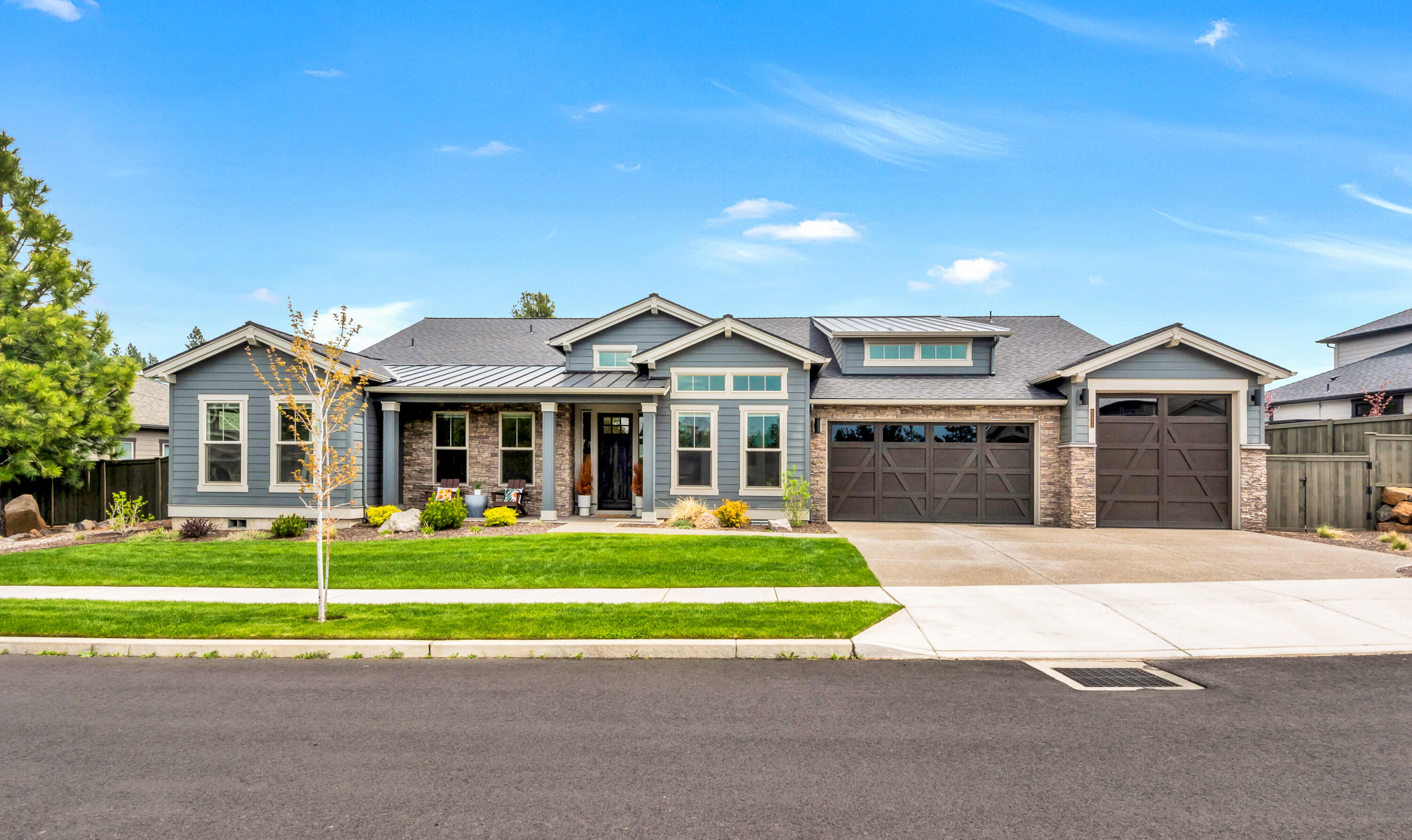Located in the desirable SW Bend community of Rivervale this 4 bed, 3.5 bath 3,375 sq. ft single level home has it all! Finishes & décor have been curated by a professional designer. The well thought out builder & designer upgrades include high end finishes, upgraded AC, double ovens, SS KitchenAid appliances, 8' tall interior doors, 3 car garage w /3rd bay sized for boat or RV. Primary suite includes tiled shower w/ freestanding soaker tub & a huge walk in closet. Dedicated office, large laundry/mud room w/ sink, coffered ceilings w/ crown molding, tankless HWH, built-ins & extensive mill work. Private guest ensuite, jack & jill bath, formal dining room, den & flex room. Exterior boasts a large covered back patio with extensive landscaping creating a park like setting. Massive solar system covers nearly 100% of the power bill. 10 min walk to Brookswood plaza with grocer, shops, & dining, Deschutes River Trl, Sunset Hill, & Wildflower Park. See attachments for full upgrades list.