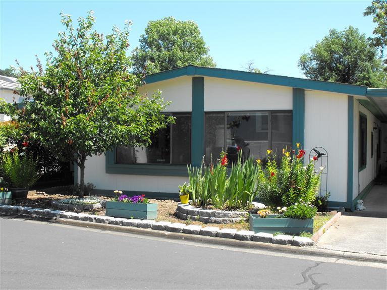 Exceptional value for a 1981 Golden West mobile home in a nice, peaceful park in Phoenix, Oregon! Large double-wide 2 bedroom/2 full bath, 1680 sq ft, 12x24 remodeled kitchen, open and spacious, large family room, utility room, 2 patios, 2 storage sheds, 12x18 workshop, garden area, 2-car parking and much more. 55+ park offers a clubhouse with a swimming pool, spa, entertainment rooms, and library. RV + boat parking available for a small fee.