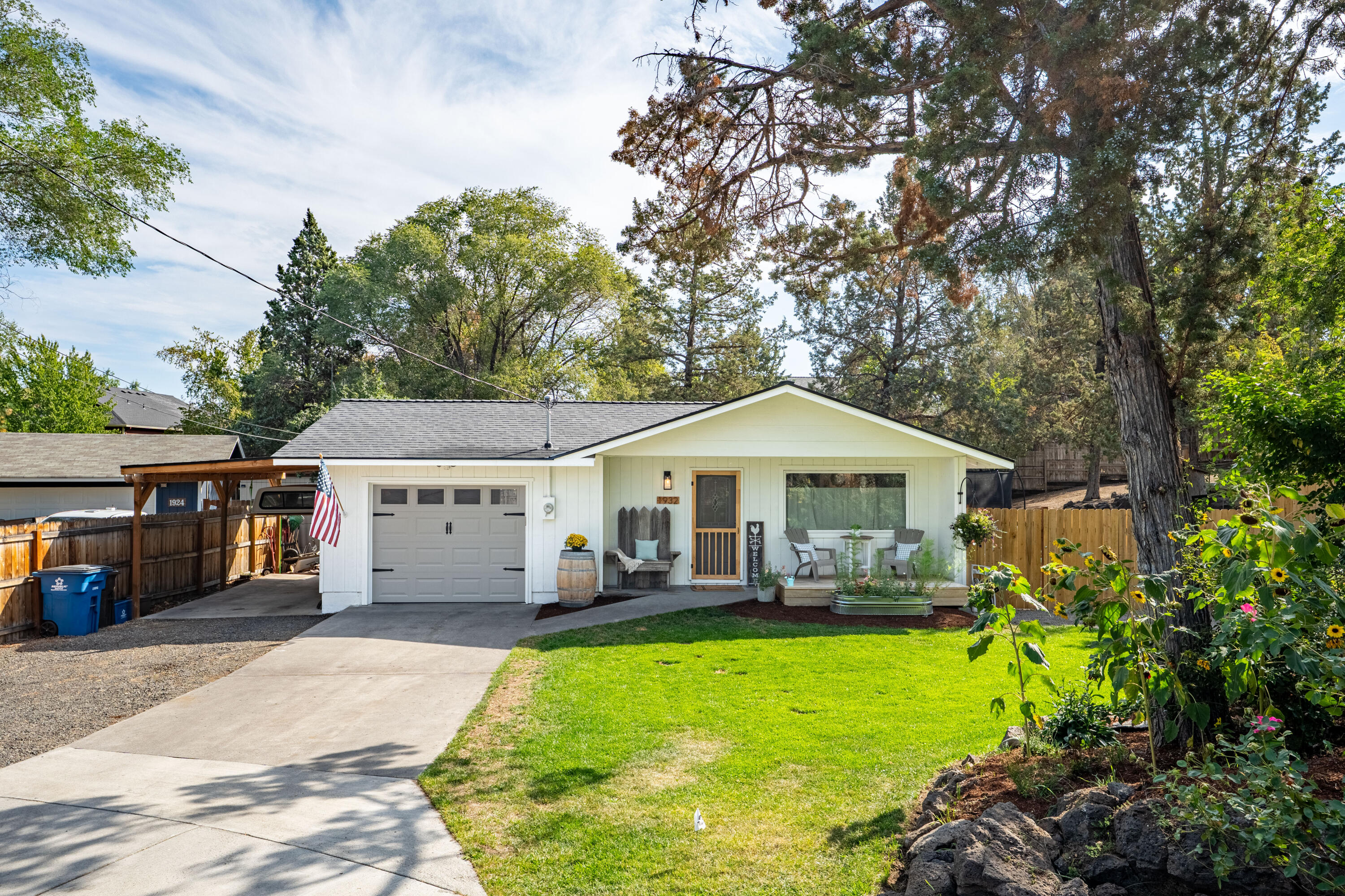 Cute as a button, turn-key, and ready for you! Situated at the end of a quiet cul de sac on a spacious lot, and just a stones throw from Quartz Park, the 3 bedroom,1 bath home has been thoughtfully updated from head to toe! Brand new roof, carport, new deck and fencing, fresh interior and exterior paint, new LVP flooring, updated lighting, newer pellet stove, and a new kitchen from the appliances, to the cabinets, full height tile backsplash and a deep basin farm sink. The home lives nicely with its open concept design, and thoughtful storage options. The backyard boasts a side patio for BBQing and entertaining, lush raised garden beds, a pergola perfect for enjoying these summer and fall months, plus plenty of additional space for toys or pets, even a coop for a few chickens! There is access to trails from the backyard, additional room for parking, and a storage shed off the back of the house. Come fall in love with this darling home, and everything it has to offer inside and out!
