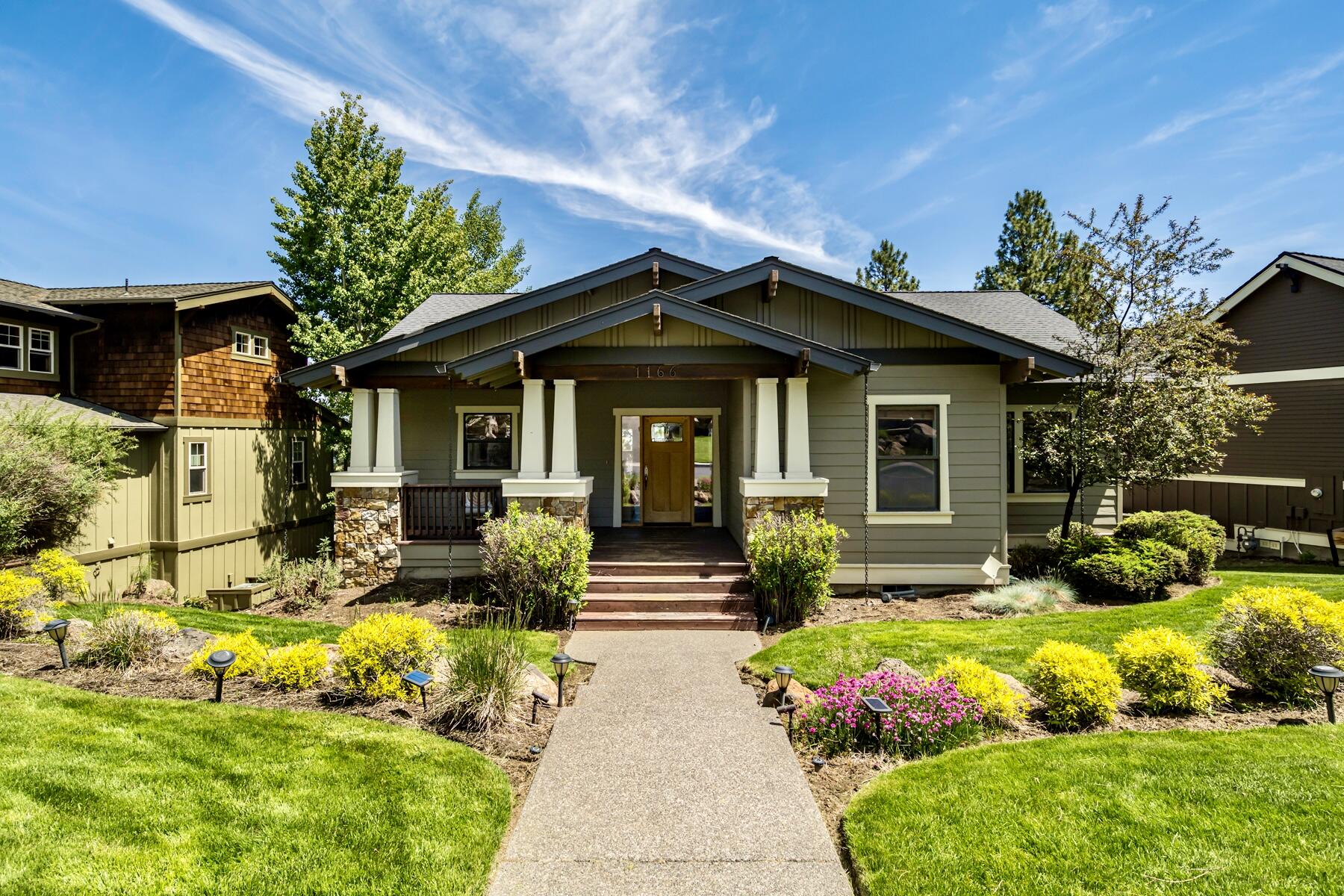 Come experience all that Bend has to offer from this beautifully designed bungalow ideally located in the Awbrey Village neighborhood in NW Bend. This light and bright home features an open floor plan and flexible living spaces. Vaulted ceilings and strategically placed windows in the great room capture northeasterly views toward Smith Rock and the Ochocos. Main level primary has separate deck access and Cascade mountain views, complete with ensuite bath featuring dual vanities, soaking tub and well equipped walk-in closet. Two additional bedrooms, another full bathroom and a laundry room are located on the main floor, while the lower level provides flexibility with a second spacious ensuite bedroom with exterior access, ideal for in-law quarters. An oversized extra deep garage has space for adventure gear plus extended storage under the home. Nearby community park and trail access down the street to the Archie Briggs Canyon and trails beyond. A wonderful base camp for Bend living!
