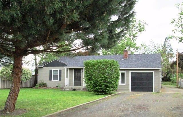 This move-in ready charming home in a quiet southwest Medford neighborhood offers a two family set-up with very large yard and rv parking. 2 bed/1 ba main house was remodeled in 2010 to show off its cheery open floor plan with beautiful hardwood floors and stone floors in bath and kitchen. Roof was new in 2014. Guest house is a clean 1bd/1ba cottage with lots of storage and light and its own private yard. This is a great opportunity for an investor or folks needing a place for themselves with a separate home for guests or additional income.