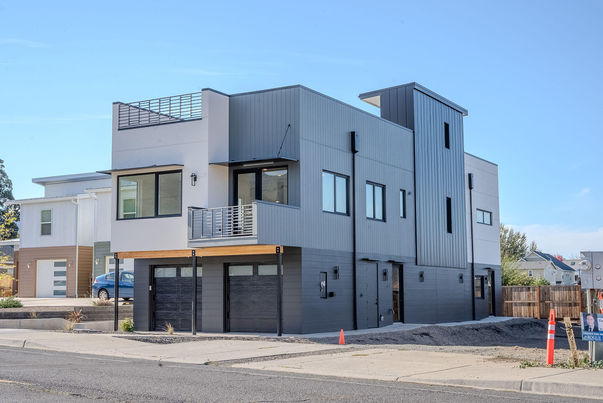 You'll absolutely love this new home in Talent, just minutes from Ashland. Designed & built to exceed energy standards w/ high-end modern living- welcome to the Romeo Project. This property offers a main single-family home with an attached ADU that would easily bring in fantastic income as a rental or the perfect design for a mother-in-law unit. Experience roof top living engineered for a hot tub, garden beds & fantastic views. This home will reach Earth Advantage Platinum status with high-performance doors & windows, an airtight healthy ventilation system, fire-resistant exterior materials, above code insulation, energy efficient HVAC & hot water systems along w setup ready for solar & EVs. Experience comfort year-round w very low utility costs & relish in the modern design boasting a level of urban sophistication that you'll truly appreciate in this one-of-a-kind home. An incredible home to live in & a very solid investment! Lot next door also available for sale as a package deal.