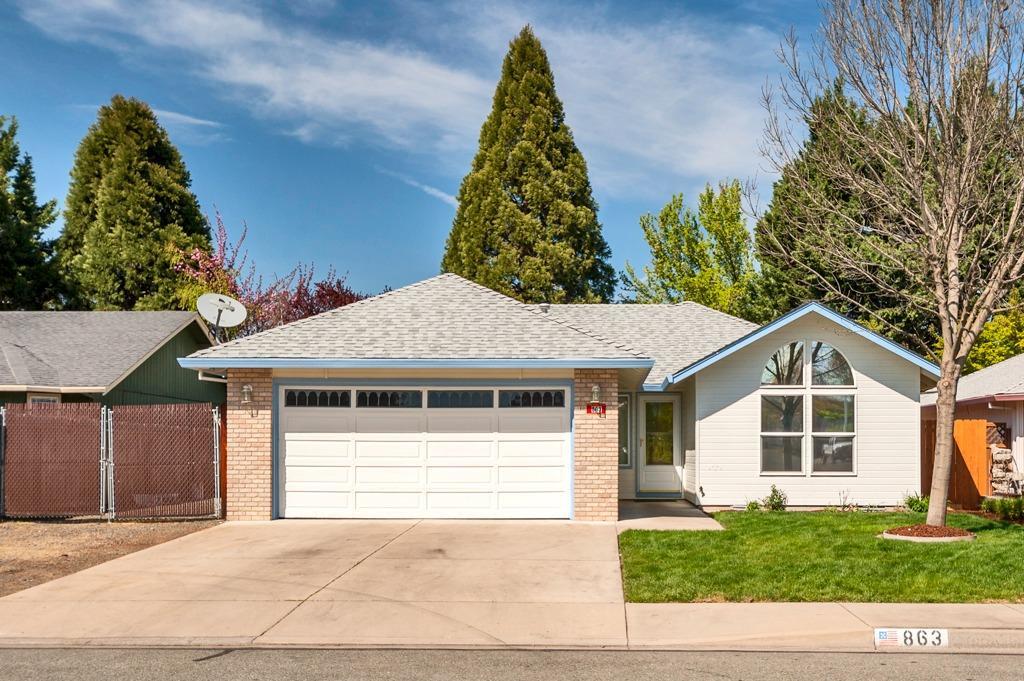Great Central Point location. New exterior and interior paint. New vinyl in kitchen and baths. Laminate floors in Living,hall and bedrooms. This home is move in ready. Large lot, raised garden beds, shed and green house. RV gated parking