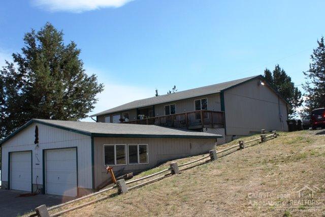 Very nice home located in Ochoco West built on a double lot with breathtaking views. The wrap around deck provides a 160 degree view of the valley and the surrounding mtns. The lot provides plenty of room to grow with possibilities of a new shop and/or RV access. The single story flrplan includes spacious rooms and a mstr bdrm with private bath. The 2 car garage is set up as a shop w more than enough room for 2 vehicles. HOA amenities include swimming pool, rifle range, stable for an additional fee.