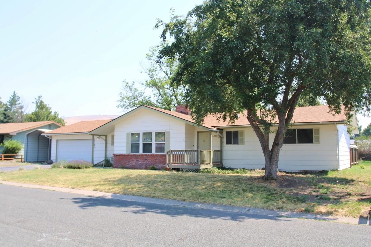 Great suburban location & attractive neighborhood too! Very close to the OCE Trail, public transportation, elementary school & is located on a .23 AC fenced lot with covered RV parking, a 2-car garage, fenced dog run area, 2 decks & more! This 3-bedroom, 2- bathroom home has many updated interior doors, light fixtures & flooring, a brand-new composition roof & a new F/A gas furnace just installed. The large wrap around kitchen with skylight has loads of cabinetry & breakfast bar & the dining space has French doors & a cozy gas fireplace & could easily serve as a den if needed. The large living room also has French doors, a 2nd fireplace and works well for today's larger furnishings. All inspections are completed for buyers review so call today. Easy to show & ready for a new owner!
