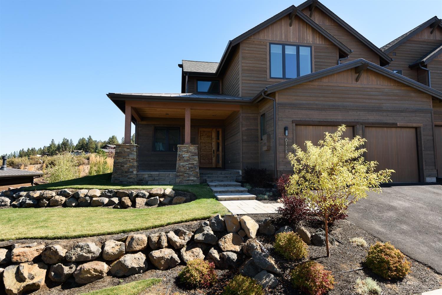 Beautifully upgraded Tripleknot townhome in Tetherow, one of Bend's most desirable golf neighborhoods. Vaulted ceilings, fine finishes and abundant natural light. Master retreat and large den on the main floor with 2 suites upstairs. Upper suite boasts Cascade mountain and golf course views, built in desk area. Chef's kitchen with gorgeous cabinetry, double islands, solid surface counters and stainless appliances. Hardwood floors throughout most of the home.