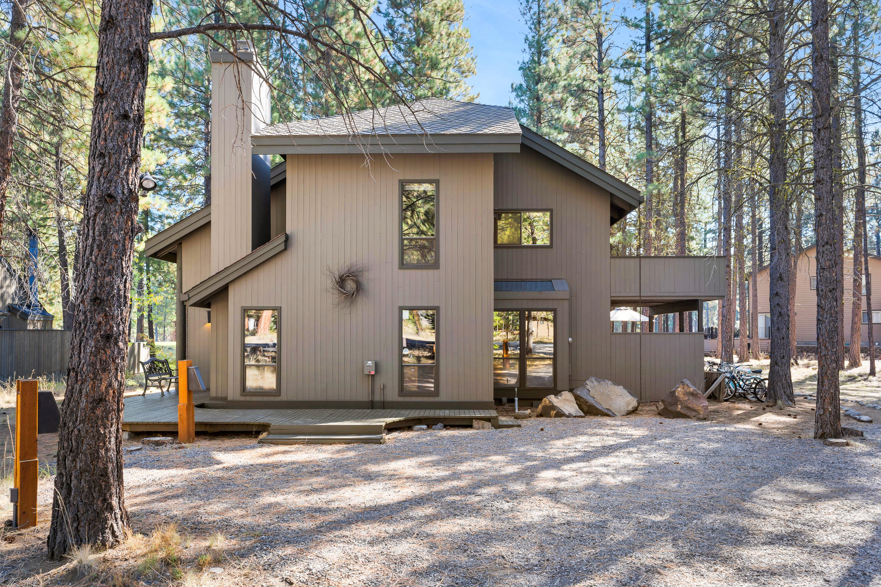 Whether you are looking for a vacation home for your family or an income producing vacation rental, this 1706 sq. ft. home on the exceptional 7th hole of the Glaze Meadow golf course will not disappoint! Across the fairway are the Glaze Meadow pools, hot tub, spa, tennis courts and pickle ball courts. The property features vaulted ceilings, a wood burning fireplace with floor to ceiling stone, and an open floor plan. With 3 decks overlooking the fairway, experience outdoor living with ease. The main-level master features its own fireplace. Upstairs features its own living space as well as two additional bedrooms and a full bath. Custom tiled showers in both bathrooms, all new appliances including a wine fridge. Fully furnished with a well stocked kitchen. Sleeps 8 comfortably, including bunk room with 4 twin beds and dresser. Bikes for 8 included. Good Vacasa rental history available upon request.