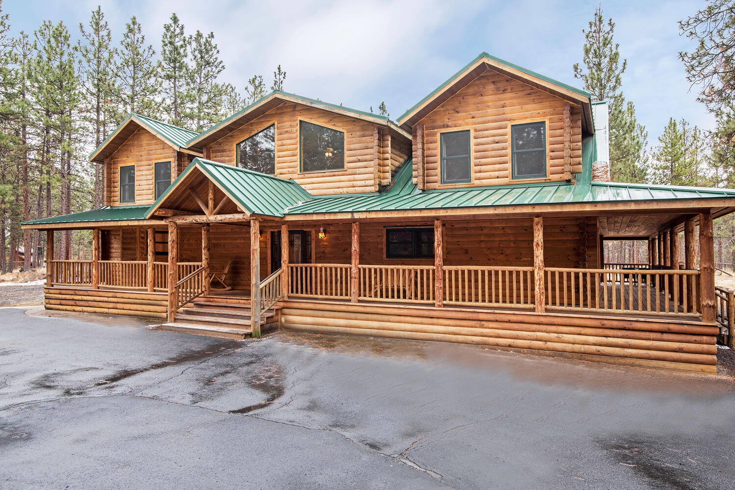 Custom log home in desirable Junipine Acres. Interior features: Open floor plan living area; Large gourmet kitchen with island; All newer stainless steel appliances; Large mud room; Downstairs master suite with large walk-in shower, soaking tub, and walk-in closets; Two upper ensuite bedrooms/bathrooms with individual study/sitting areas; Upstairs loft; Wide plank pine flooring; Wood-framed windows. Exterior features: Metal roofing on all structures; Covered wrap-around front porch; Very private and protected setting; 2 RV pads with hookups; Large outdoor living/patio/firepit area; Completely paved access/driveway; Entire property fenced & gated; Serviced by community water. Additional structures include: 1680 square foot bunkhouse with unlimited opportunities (fully permitted bath & washer/dryer hook-up; office and more); Large barn/shop building; detached 2 car garage. Neighborhood offers private access to Whychus Creek for hiking/riding/fishing. All of this only 4 miles from Sisters