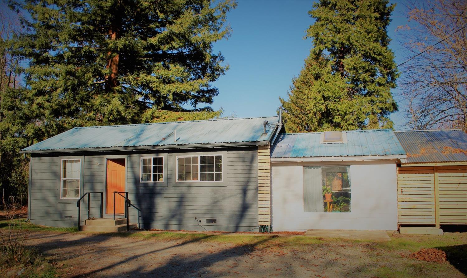 Welcome to your peaceful oasis in the charming NW area of Grants Pass. Enjoy the sounds of nature from Gilbert Creek running through the big backyard that is ready for your gardening/entertaining ideas. New windows, freshly painted and delightfully designed and updated throughout. Relax in the all seasons indoor/outdoor patio. Walking distance to town close enough to take a drive to the beautiful Rogue River. Motivated Seller!