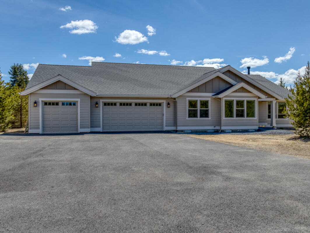 Don't miss out an opportunity to own a builder's own custom home, just completed in September 21'!  
Beautiful 3+ bdrm/2 bath home is 2,348 sf, w/ attached 1,047 sf 3+ car garage, + 36x36 shop for your RV/boat & toys!  Located on 5 fully fenced, gated, private & beautifully treed acres.  The open concept floorplan is set up for ENTERTAINMENT, with an amazing 13x23 GOURMET kitchen located at the hub of it all!  The kitchen is any chef's dream, featuring custom knotty alder cabinets & granite counter tops, w/ 10' foot island, dual built in refrigerators,  double oven & 36'' range + another oven! Its sensible design allows plentiful space to prep, cook, dine & entertain all at the same time!  The pot filler, 2 sinks, commercial range hood & spacious pantry located just off the kitchen. The kitchen opens up to the vaulted great room, featuring a wood burning fireplace that is perched upon a floor to ceiling rock hearth. formal dining located off the great room.
To much to list - Must See!!