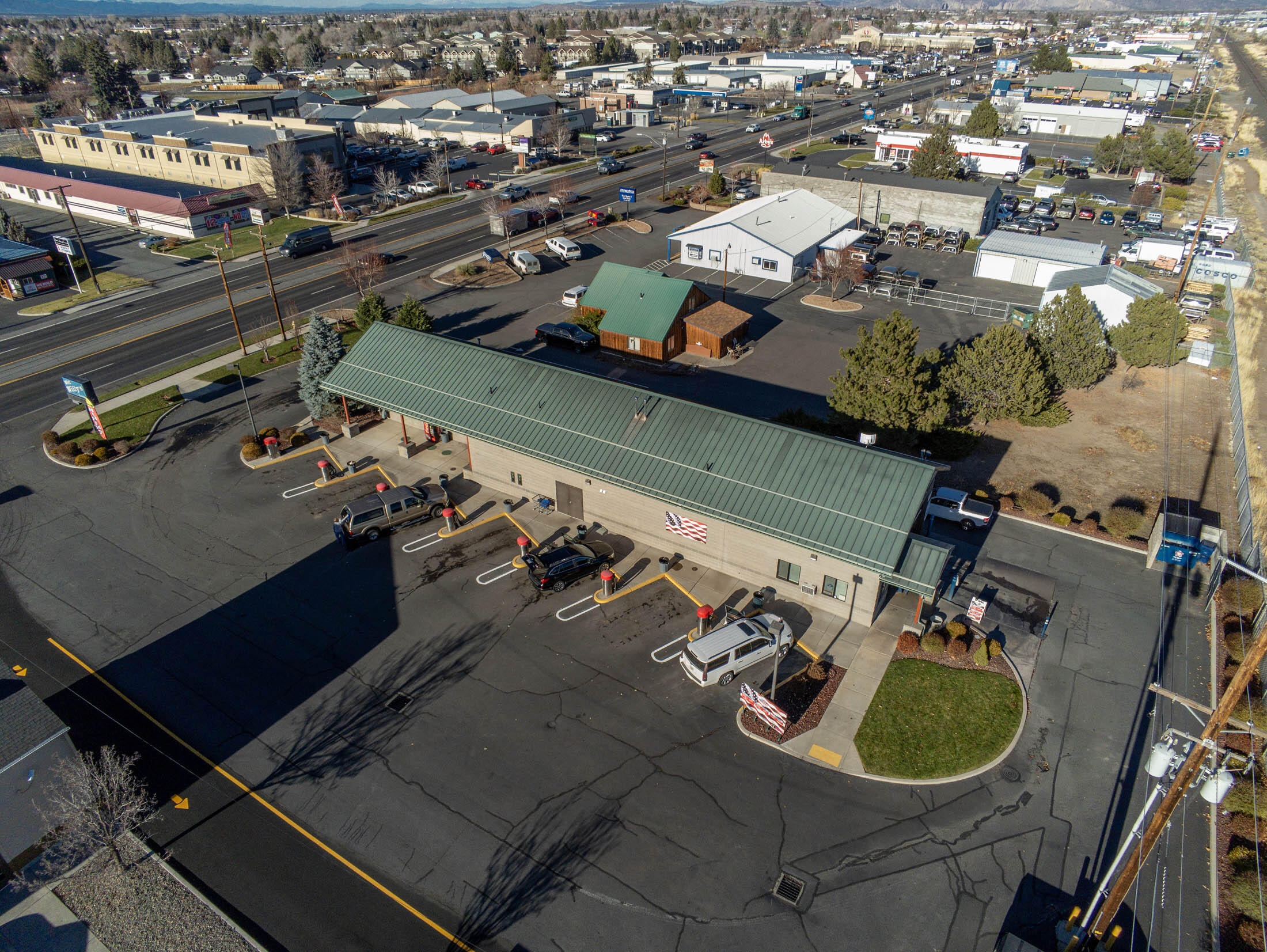 PRICE REDUCTION!  A rare opportunity to purchase a prime commercial property with a well-established profitable car wash business.  One building constructed in 2004.  The business was established in 2005.  The property has Highway 97 frontage for easy access and great visibility with 34,000 average daily traffic count.  Neighbors include McDonald's, Coastal Farm and Ranch, Best Western Motel, Safeway, Dairy Queen, Dollar Tree, Lowes, Carl Jr.'s, and Valvoline Instant Oil Change  next door.  Property has been well maintained.  Completely new Tunnel Master WBC with Innovative Control System installed in 2019.