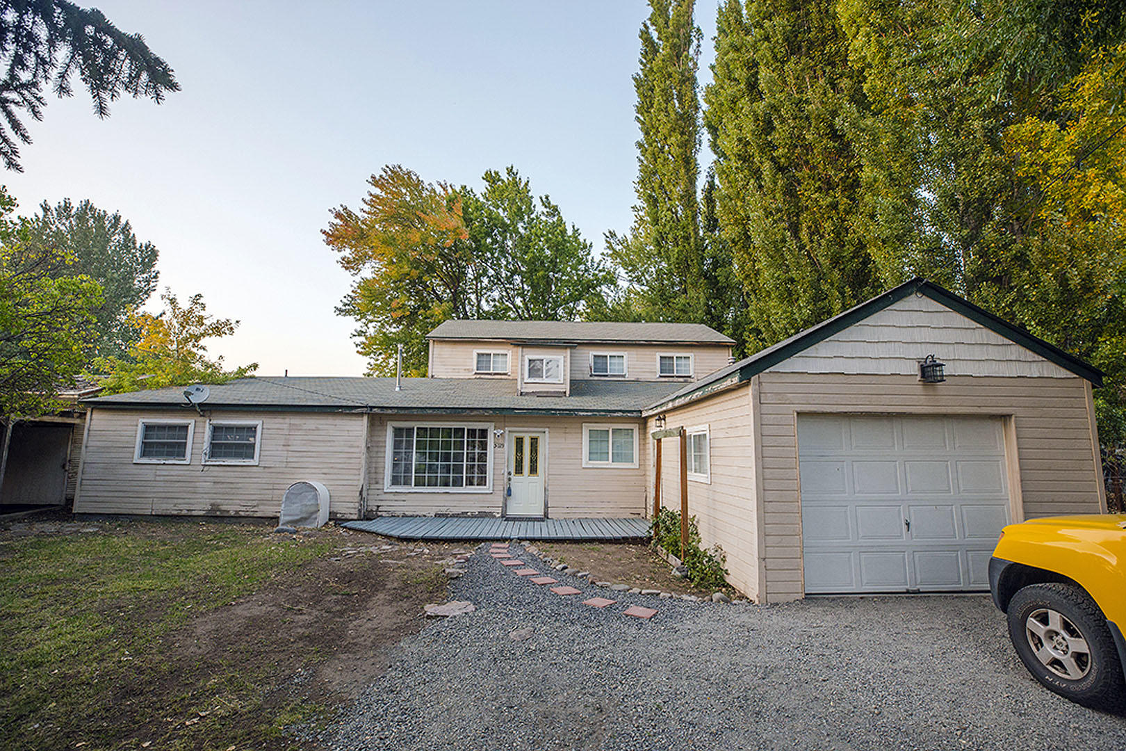 Don't miss touring this home.  Seller in progress of completing repairs.  Currently, new gas,  electric meters, new 200 amp service, downstairs bath areas upgraded.  Some doors are being repaired.  Exterior landscaping has been cleaned up and new gravel spread.
This home is located in a suburban area offering easy access to shopping, schools.
This home sits on a half acre and offers 2,628 square feet. New photos coming