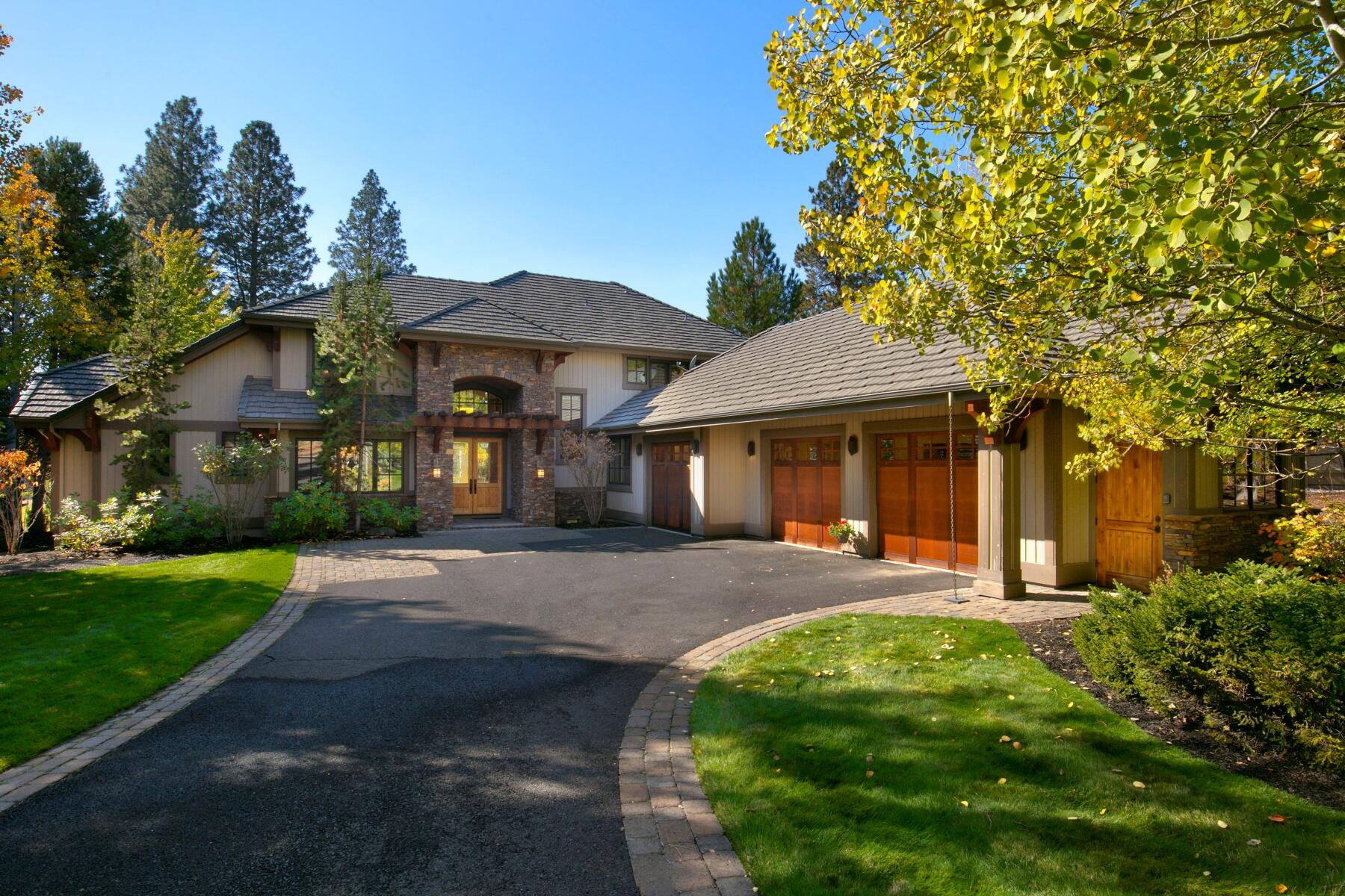 Stunning Tuscan-inspired home built by Pacwest Builders, showcases exquisite finishes & an open floor plan. Highlights include high ceilings, hardwood floors, & abundant natural light from south-facing windows. The great room boasts an impressive fireplace, while the dining area features elegant built-in cabinets. The sunny kitchen is equipped with high-quality appliances, granite counters, & ample cabinetry, plus a cozy breakfast nook. On the main level, you'll find dual primary suites. Virtual staging show decorating options. Two spacious bedrooms & a large bonus room are upstairs. The 4th bedroom, with protected balcony, serves well as an office. The property overlooks the 17th fairway of the private Broken Top golf course, providing peaceful views of open space & pond. Set on a generous .45-acre landscaped lot, the home includes an expansive rear paver patio. Oversized 3-car garage. Embrace the CO lifestyle, close proximity to Mt. Bachelor, forest trails, schools, & downtown Bend.