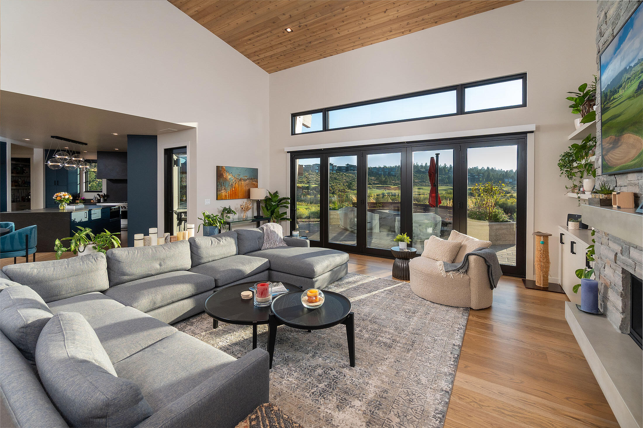 Nestled in Tetherow's desirable ''Kidd Corner,'' this Mountain Modern PacWest Custom Home blends architectural beauty with privacy & luxury for Central Oregon living. The striking design maximizes golf course & mountain views while enhancing passive solar efficiency. The exterior complements the natural surroundings, and the interior blends modern aesthetics with functional design for a welcoming atmosphere. The grand foyer leads to a spacious great room and stacked stone fireplace. Chef's kitchen boasts a center island, wet bar, prep sink, appliance garages, wine fridge, large pantry & more. Accordion doors open to a stunning patio perfect for entertaining. Main-level has the ultimate primary suite plus a versatile office 4th bedroom. Upstairs, two private suites provide restful retreats. The coveted Sprinter/RV garage plus 2-car oversized garage has space for all your toys. Equipped w/ substantial high-tech features, this home ensures safety and efficiency for any lifestyle.