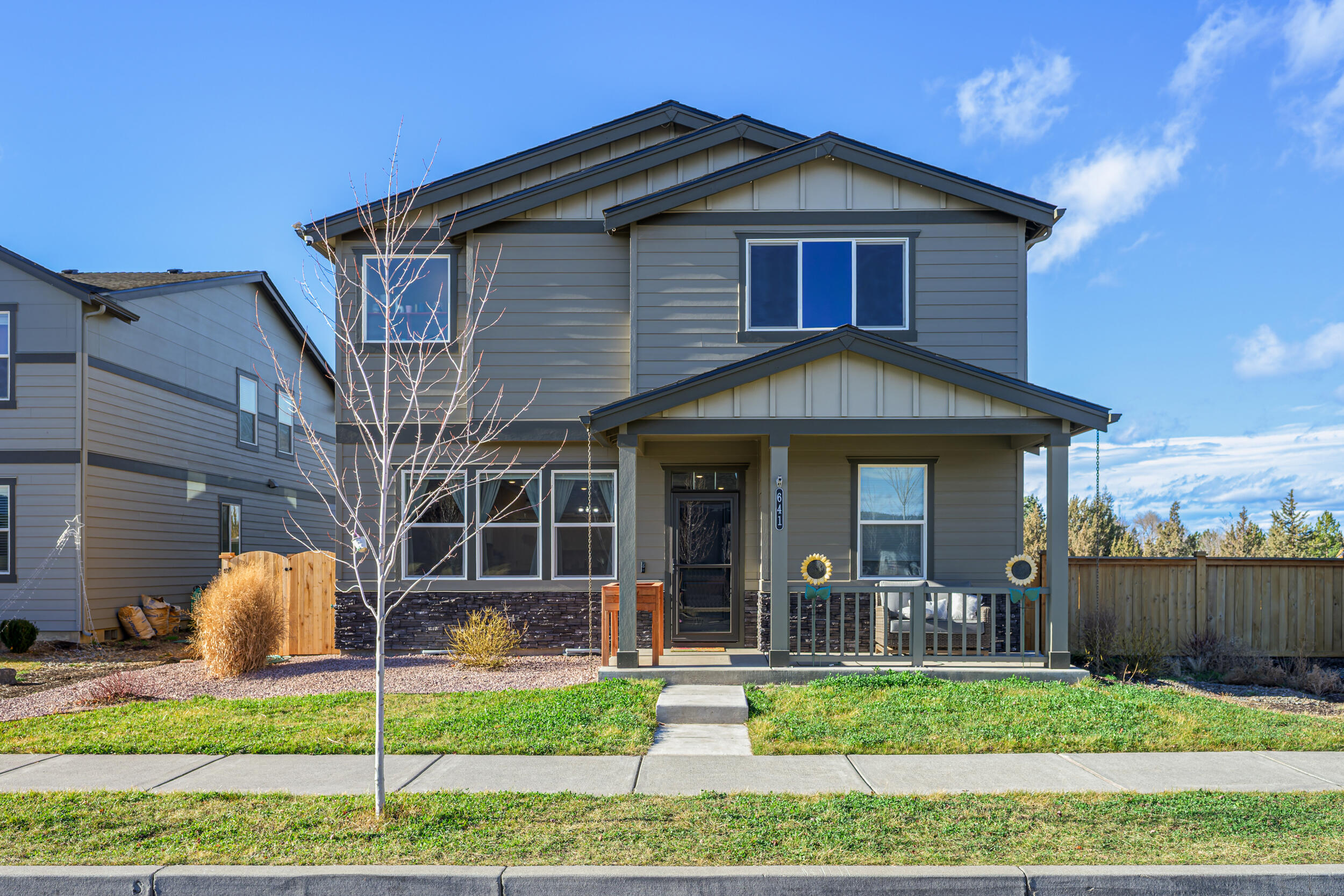 Located in a highly sought-after neighborhood, this exceptional home stands out as the largest residence on the largest lot in the immediate area. Designed with an open-concept layout, the main living spaces flow effortlessly, offering both comfort and functionality for everyday living and entertaining.

Enjoy close proximity to scenic trails, a spacious yard, pergola & two-car garage with rear alley access.

With its prime location, expansive lot, and thoughtful layout, this home offers a rare opportunity! Do not miss out!
